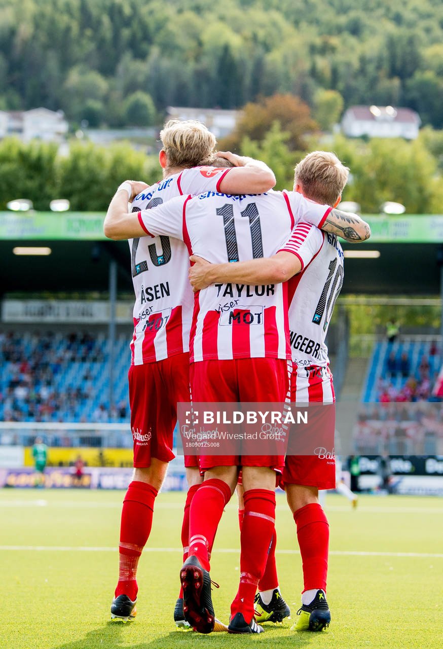 Robert Taylor of Tromsø celebrates with teammates Gjermund