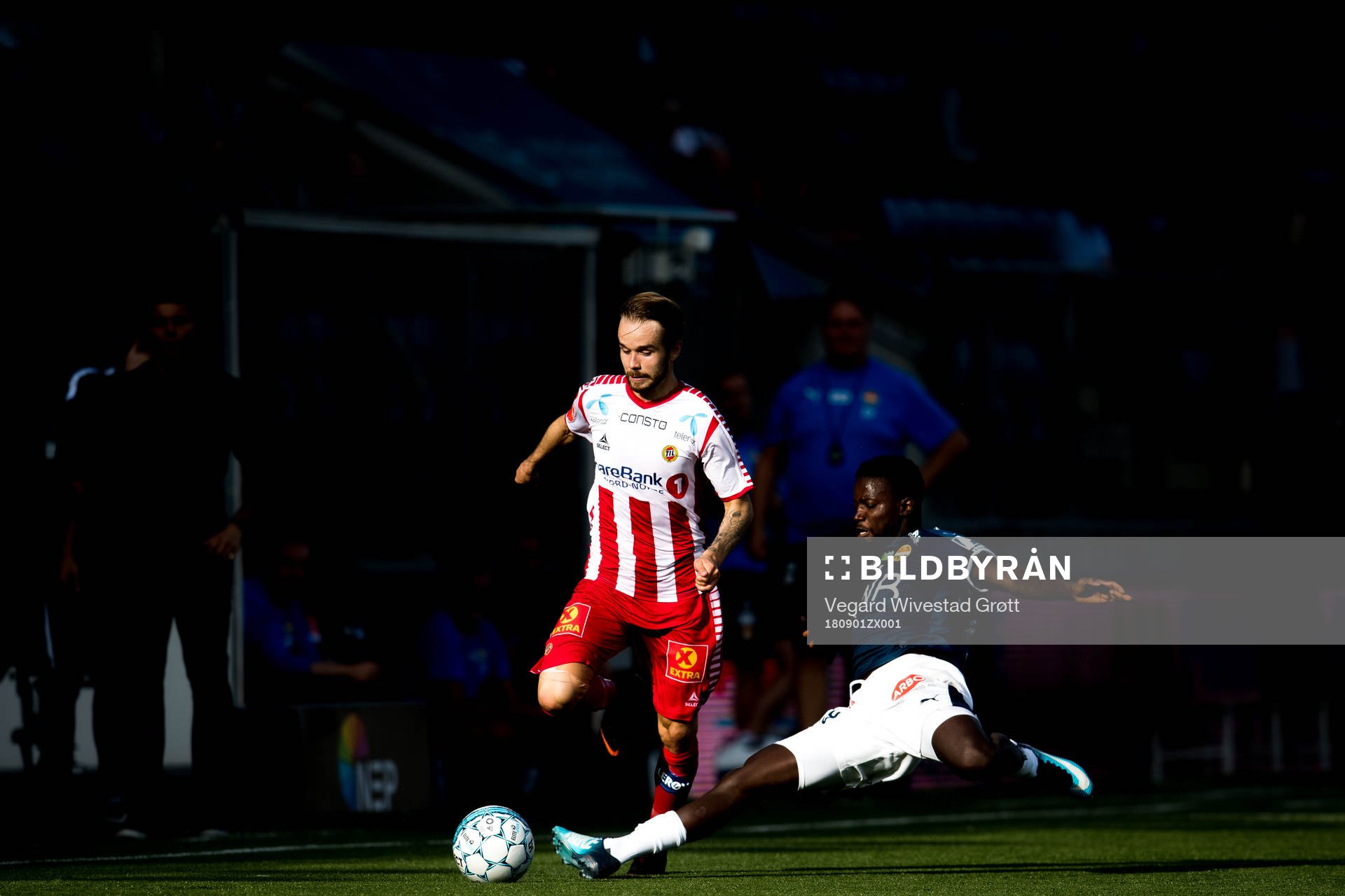 Daniel Berntsen of Tromsø and Francisco Júnior of Strømsgodset during the Eliteserien match between Strømsgodset and Tromsø on September 1, 2018 in Drammen.
