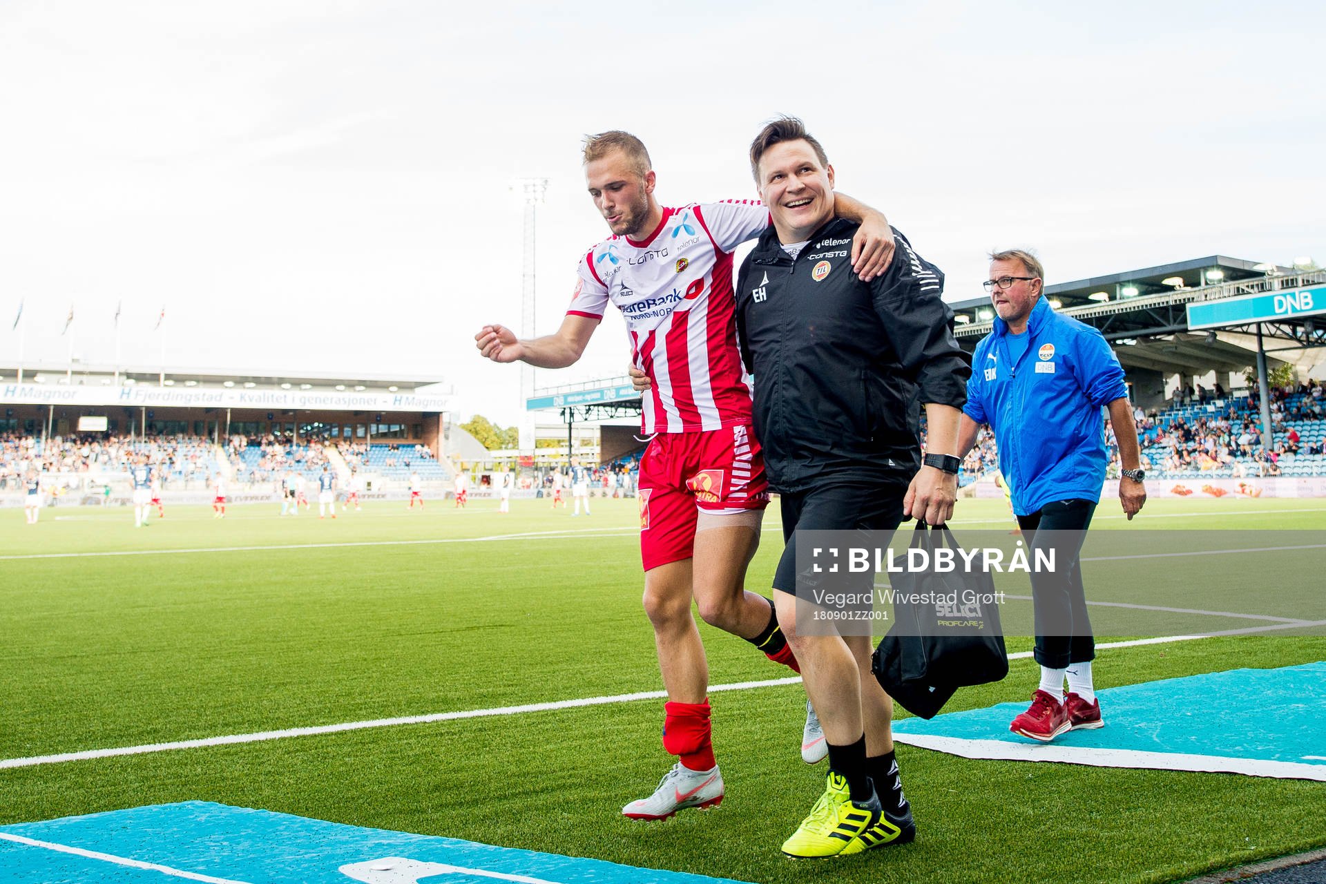 Lasse Nilsen of Tromsø limps off with an injury