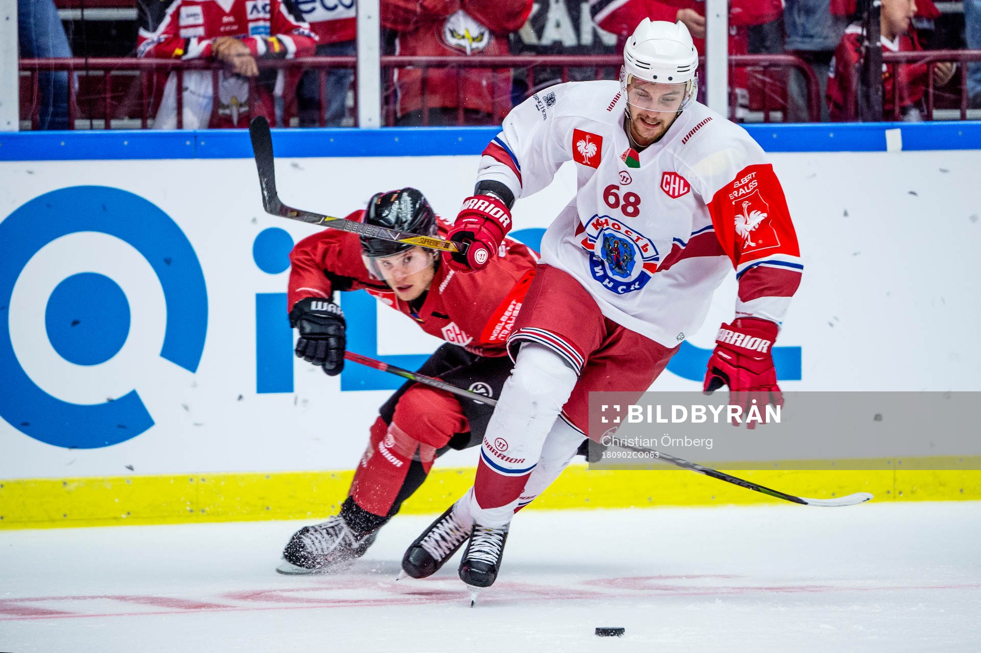 Pavel Kazakevich of Yunost Minsk and Christoffer Forsberg