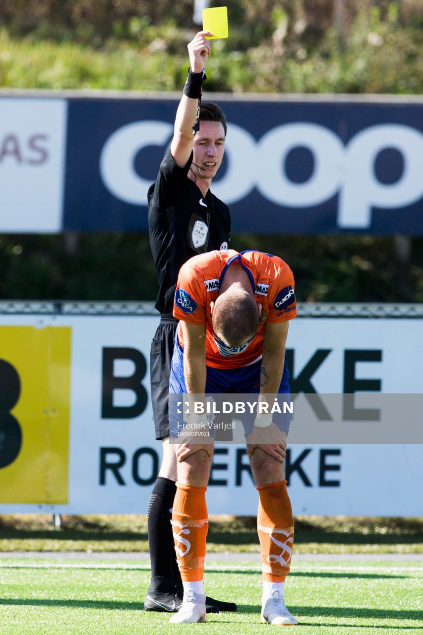 Aron Elís Thrándarson of Aalesund is shown a yellow card