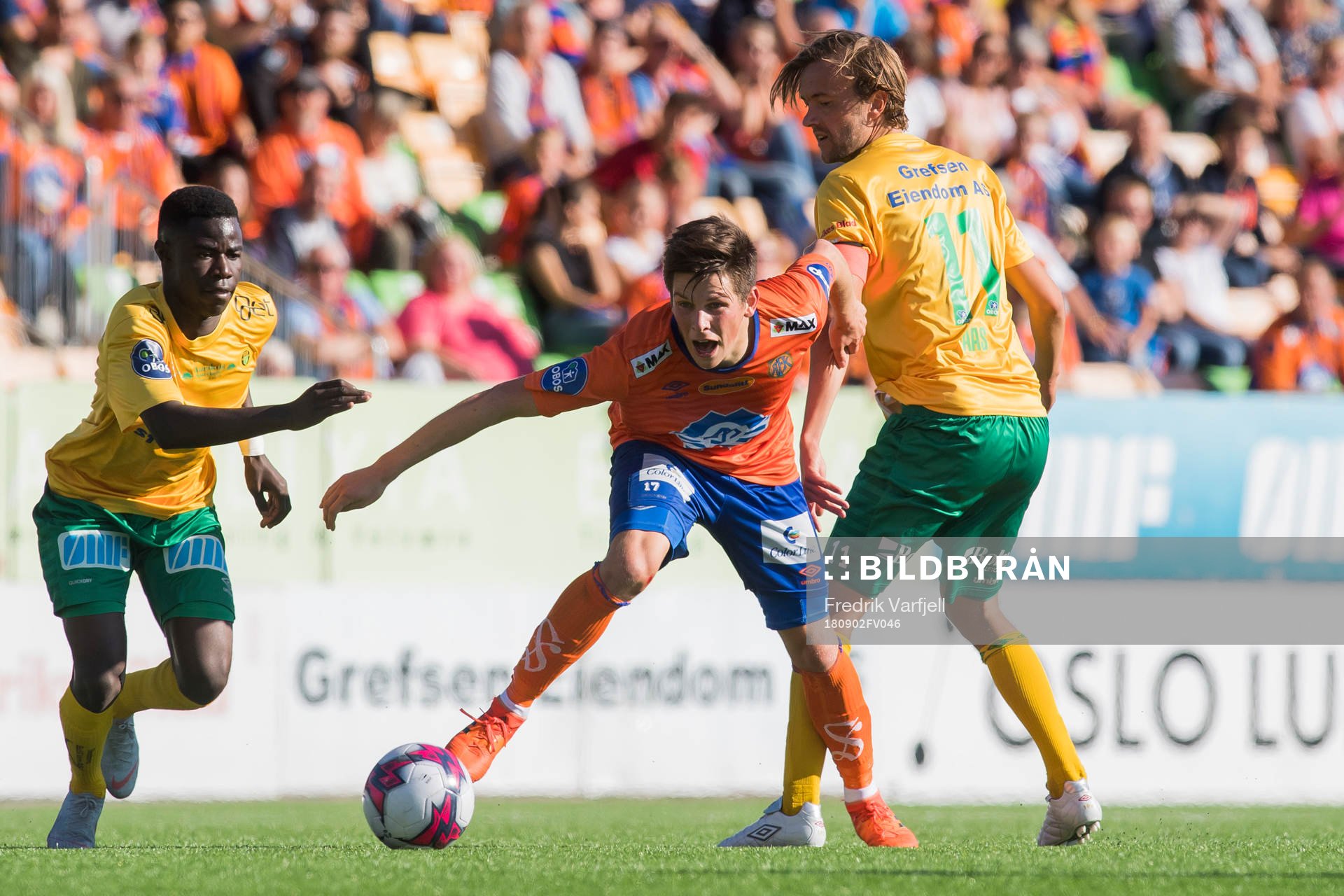 Eric Kitolano of Ull/Kisa and Sondre Fet of Aalesund and Christian Aas of Ull/Kisa during the OBOS-ligaen match between Ull/Kisa and Aalesund on September 2, 2018 in Jessheim.