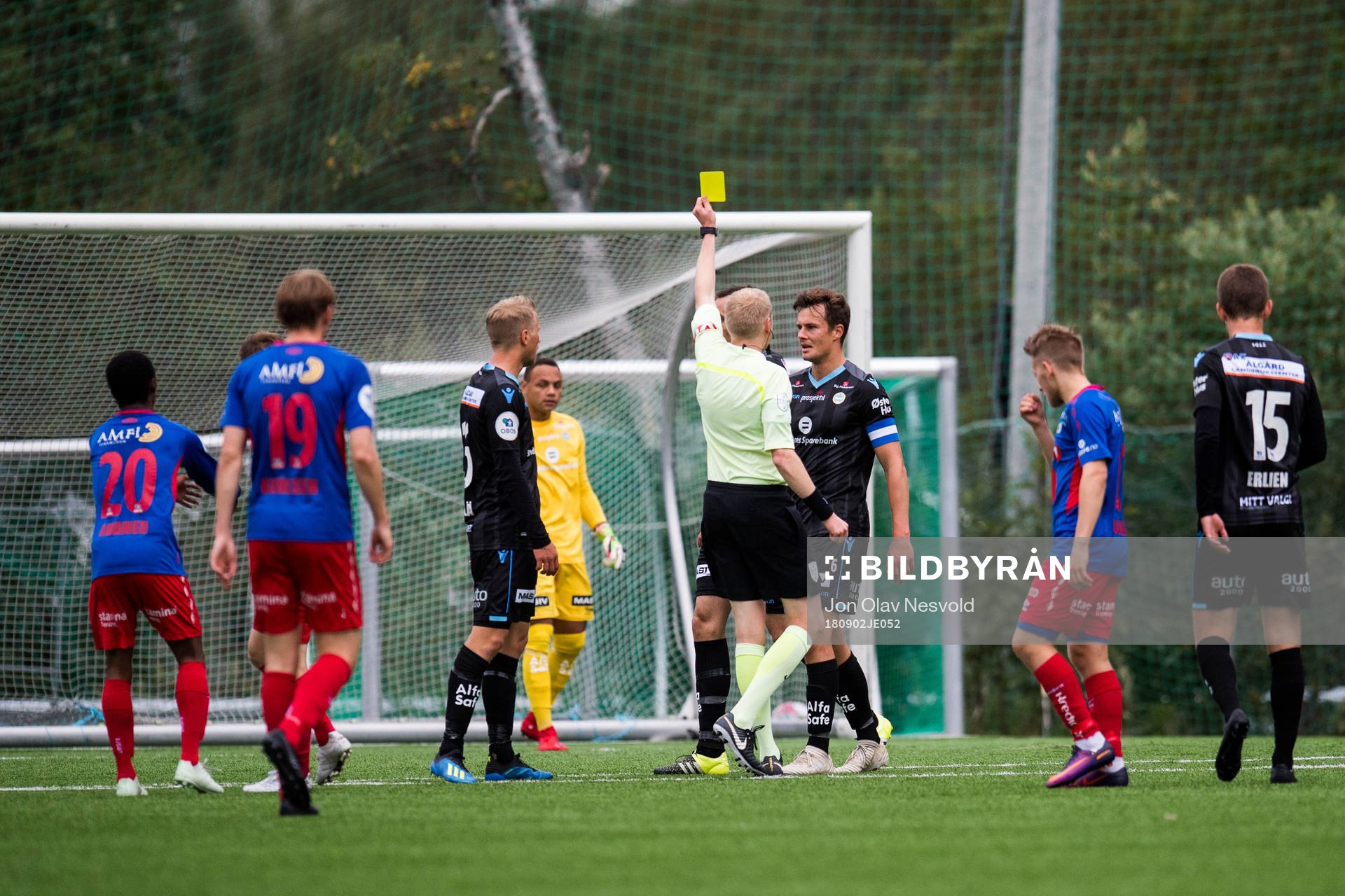 Niels Vorthoren of Sandnes Ulf is shown a yellow card
