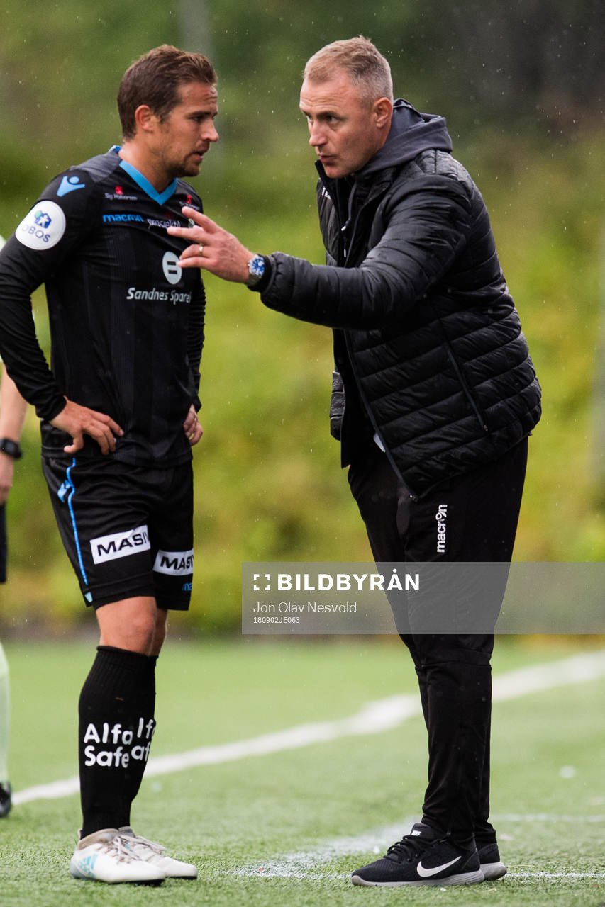 Bjørnar Holmvik of Sandnes Ulf and Bengt Sæternes, head