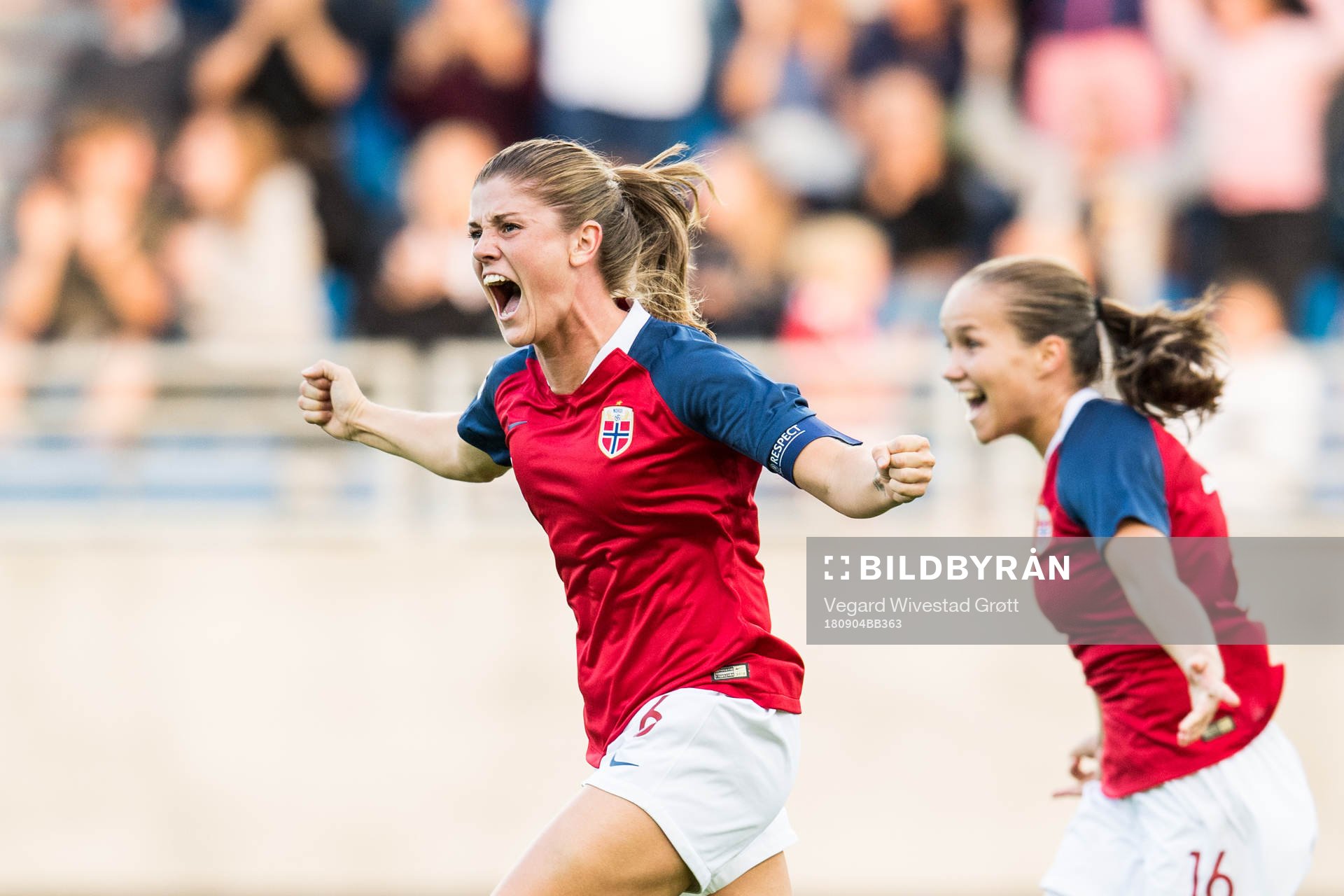 Maren Mjelde and Guro Reiten of Norway celebrate at the