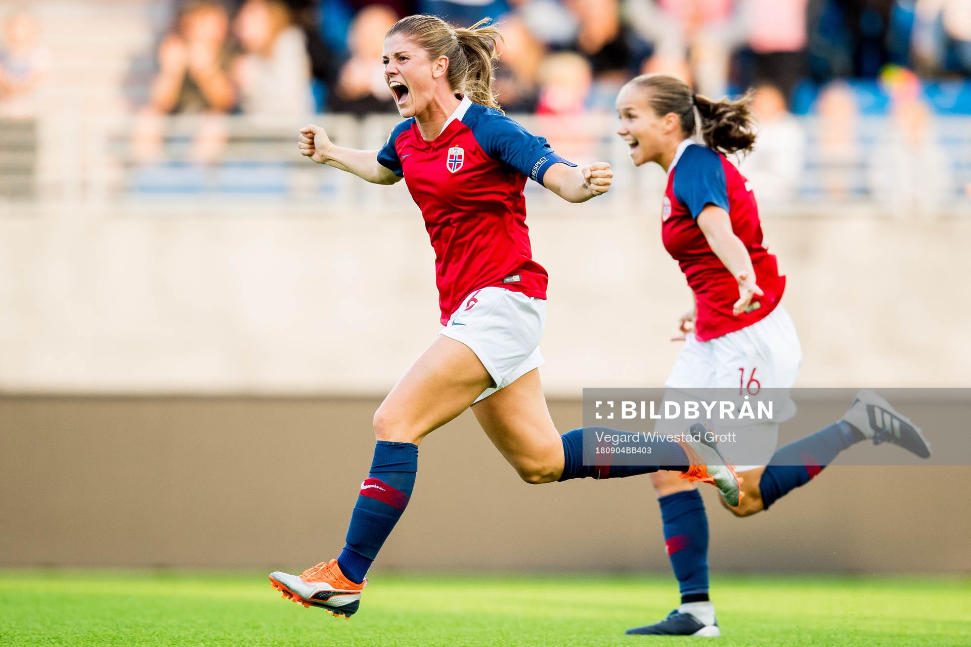 Maren Mjelde and Guro Reiten of Norway celebrate at the