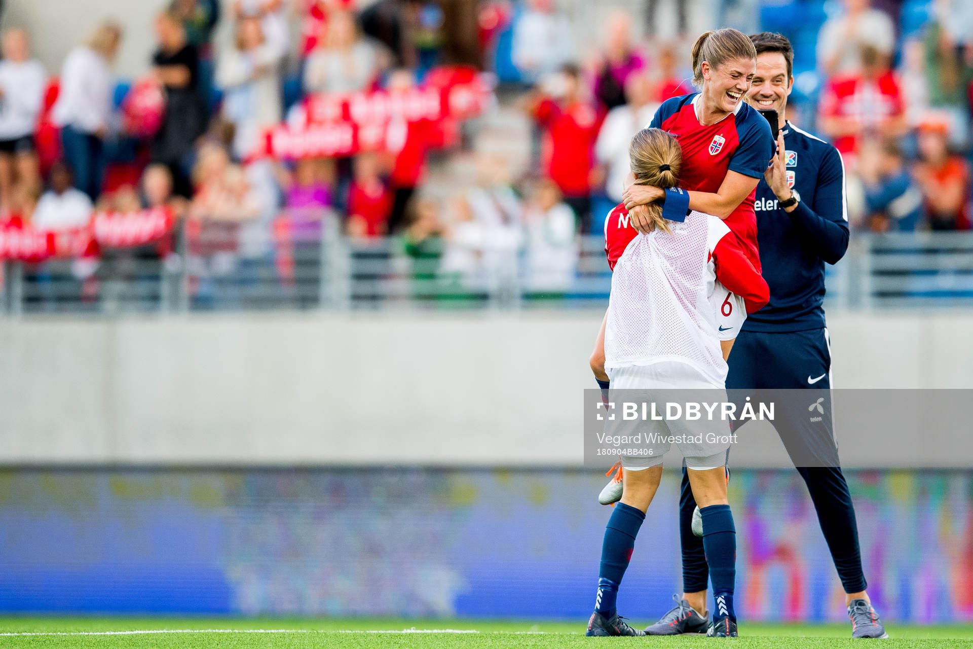 Ingrid Ryland, Maren Mjelde and Terje Skeie of Norway