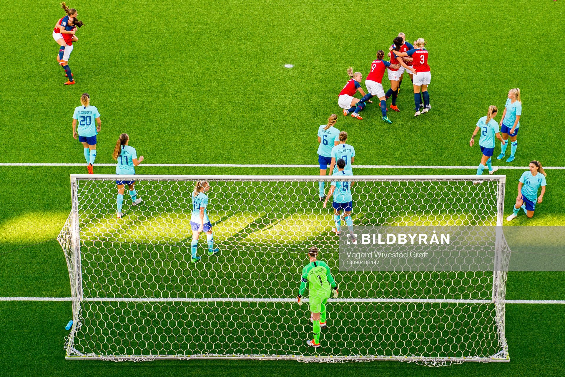 Ingrid Syrstad Engen of Norway celebrates with teammates