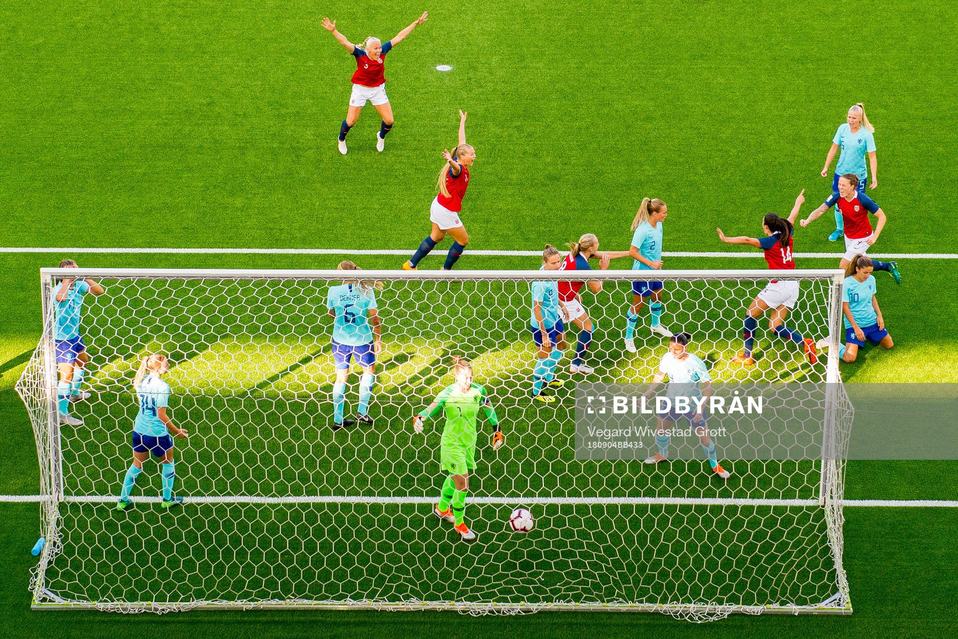 Ingrid Syrstad Engen of Norway celebrates with teammates
