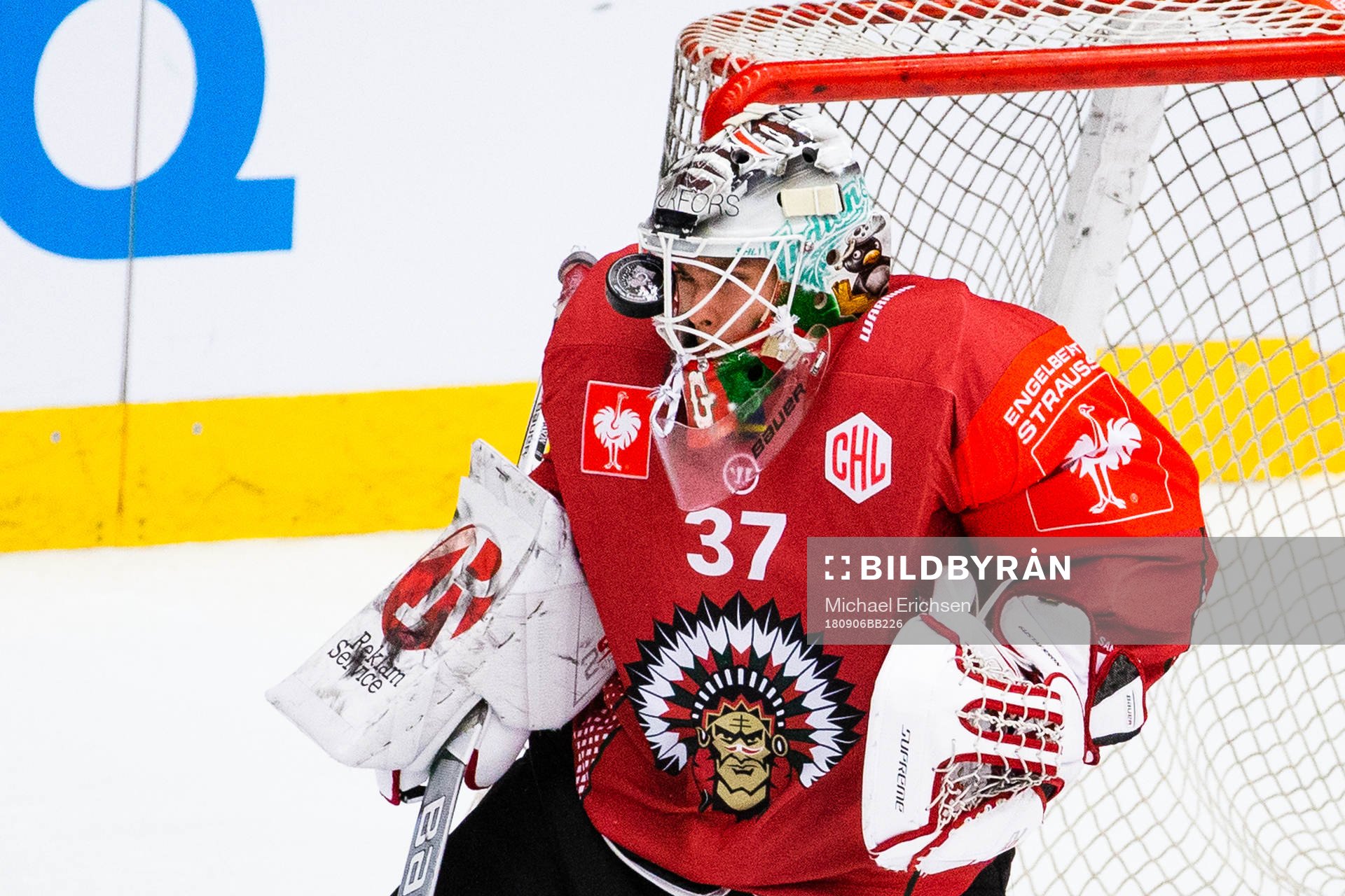 goalkeeper Johan Gustafsson of Frölunda gets hit by a puck