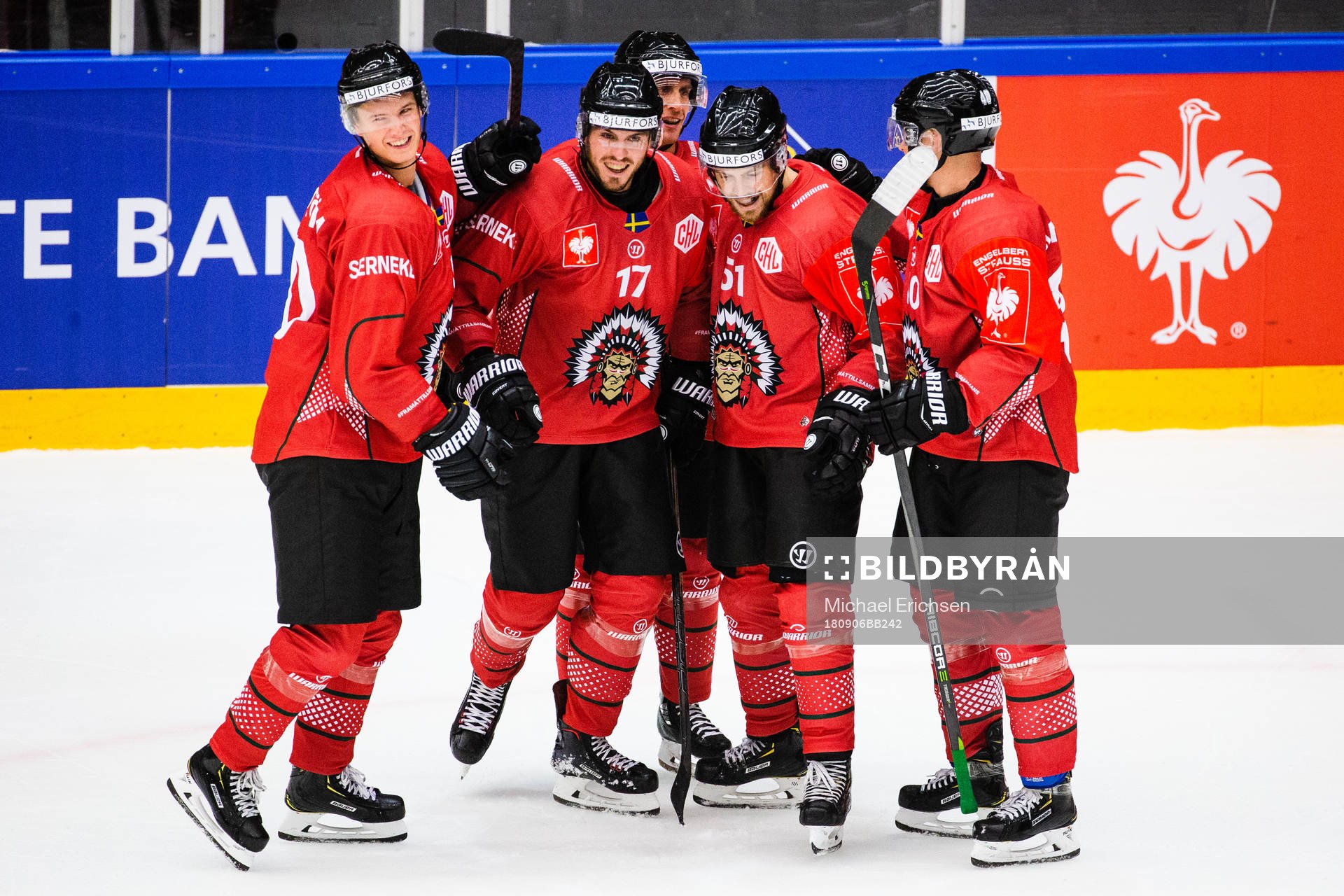 Mats Rosseli Olsen (second to the right) celebrates with