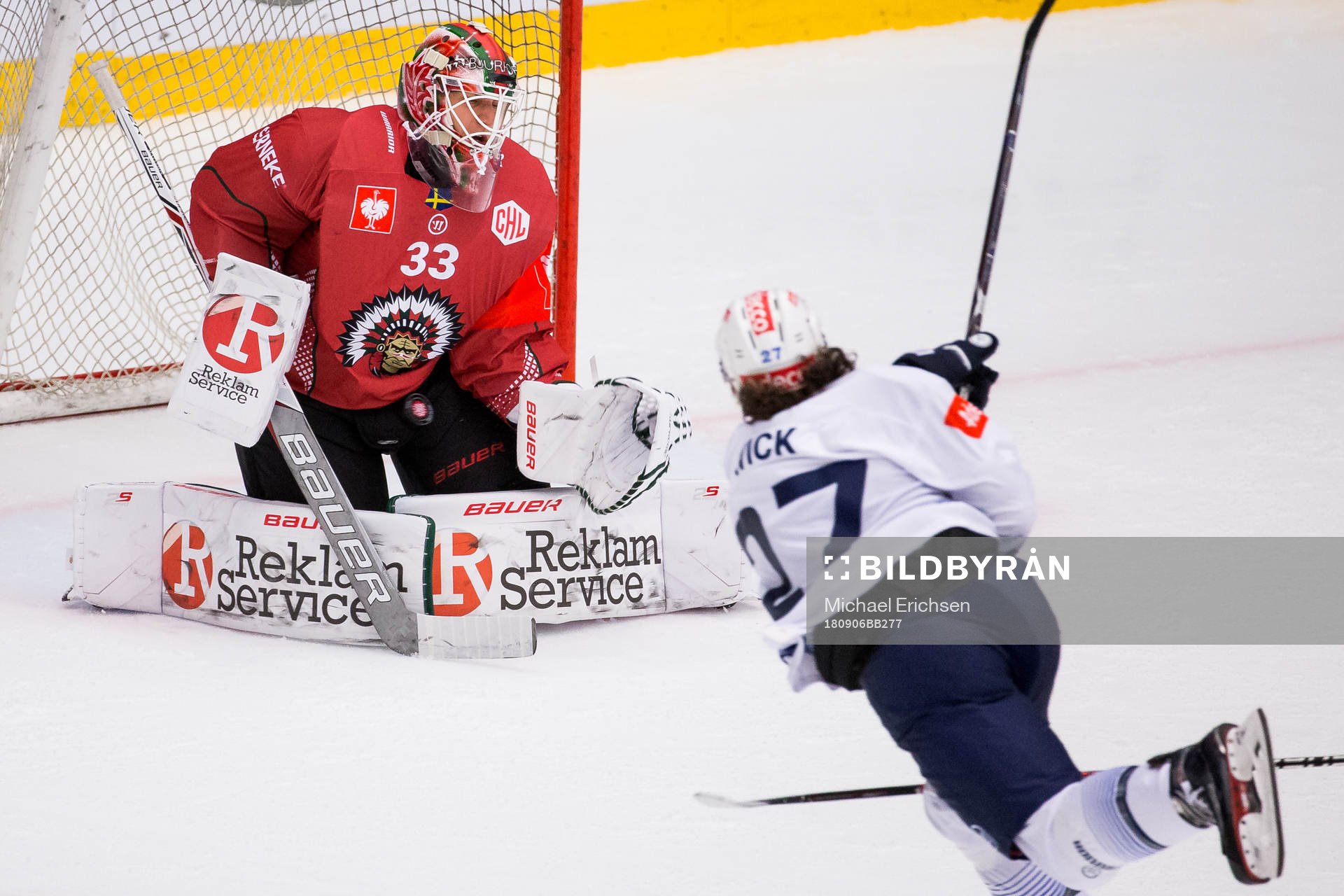 Goalkeeper Johan Mattsson saves a shot from Roman Wick of
