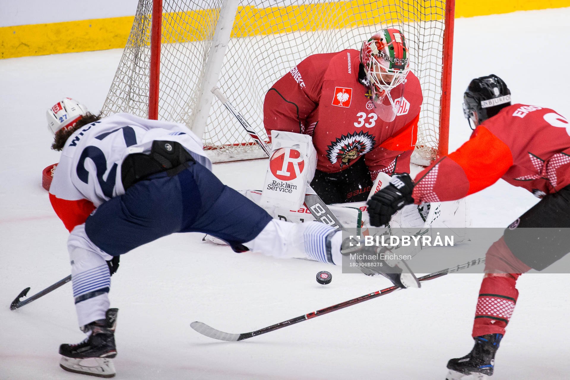 Goalkeeper Johan Mattsson saves a shot from Roman Wick of