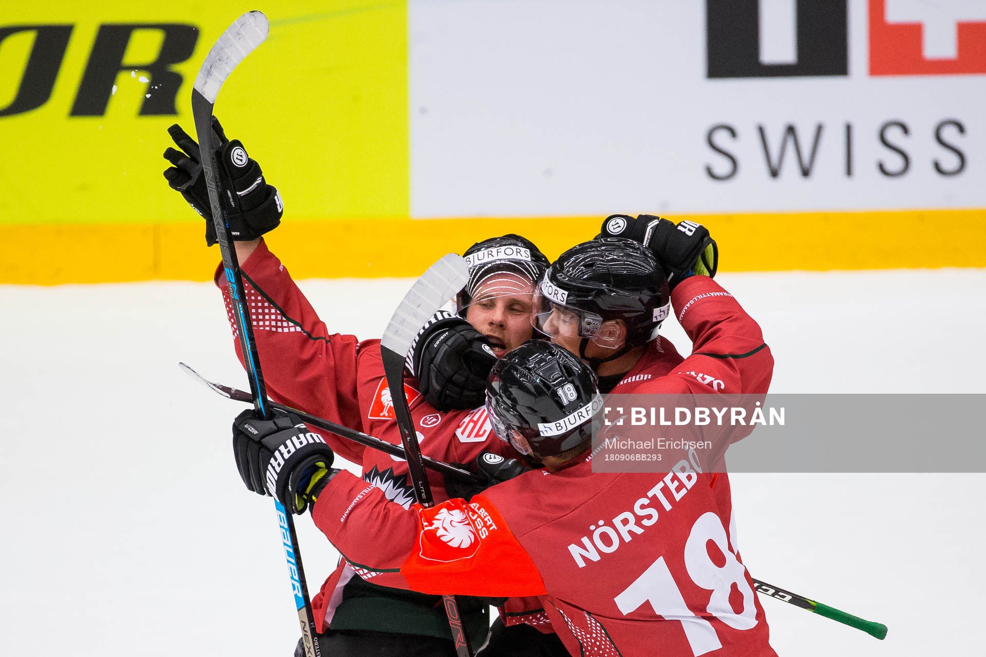 Viktor Ekbom celebrates with Joel Mustonen and Mattias