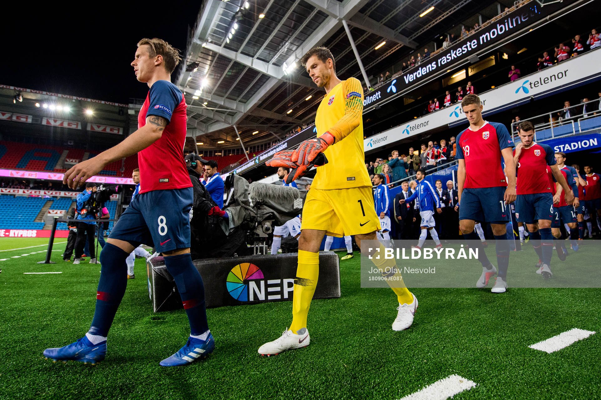 Stefan Johansen of Norway, goalkeeper Rune Almenning
