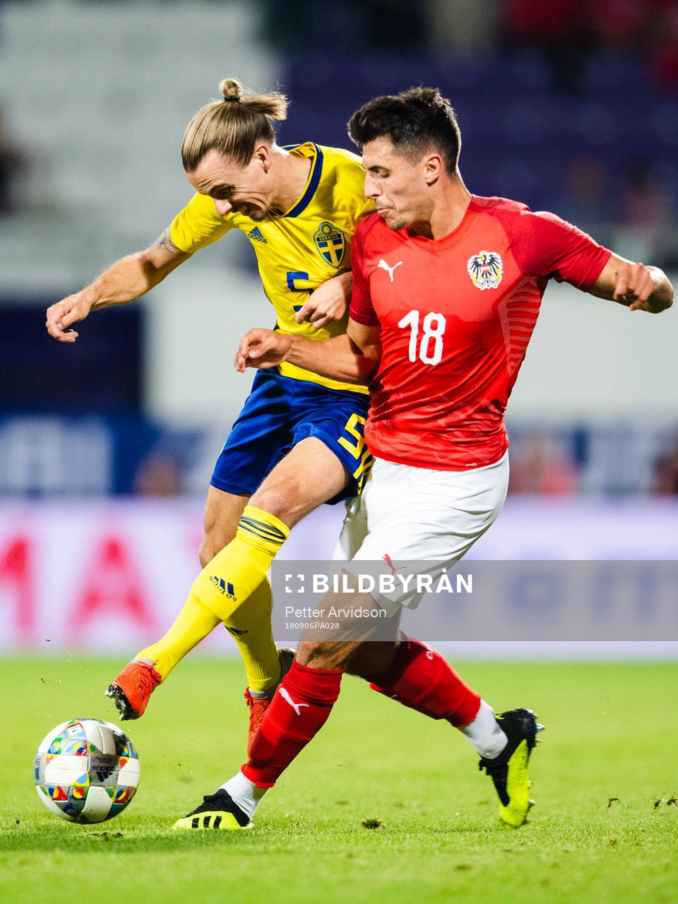 Niklas Hult of Sweden and Alessandro Schoepf of Austria competes for the ball during the international friendly football match between Austria and Sweden on September 6, 2018 in Wien.