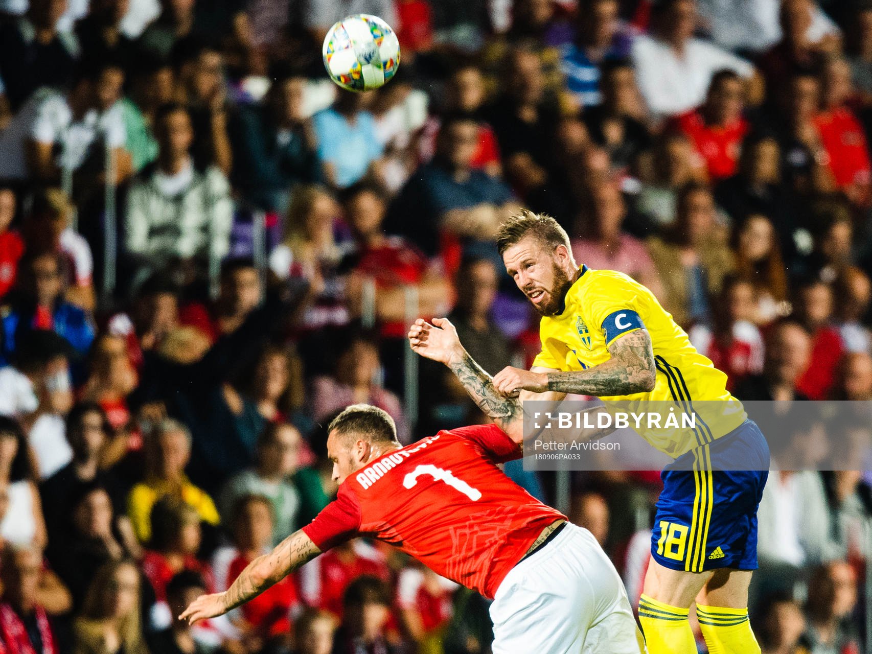 Marko Arnautovic of Austria and Pontus Jansson of Sweden
