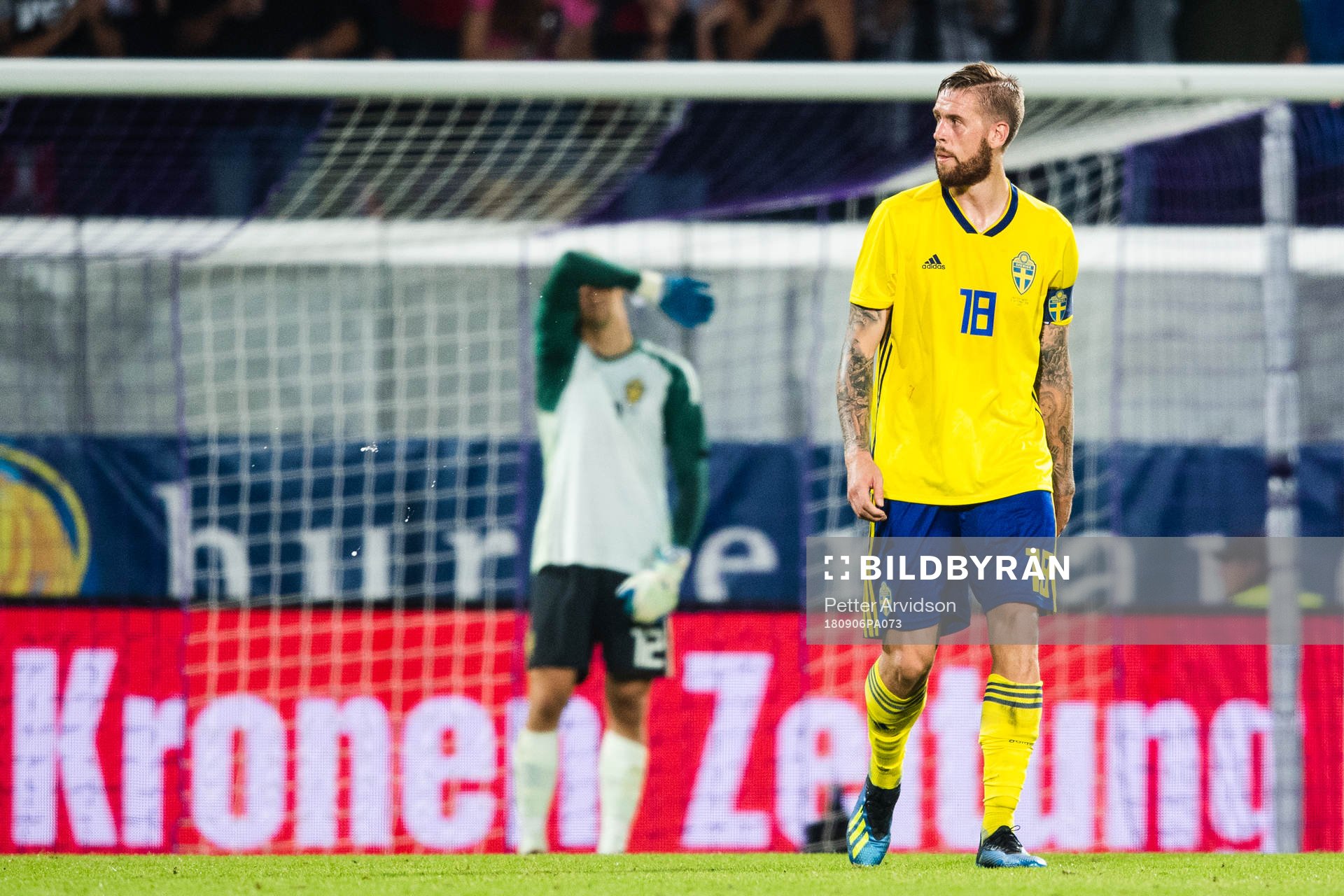 Pontus Jansson of Sweden looks dejected