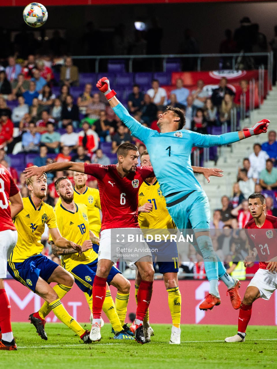 Pontus Jansson of Sweden sees goal keeper Heinz Lindner and