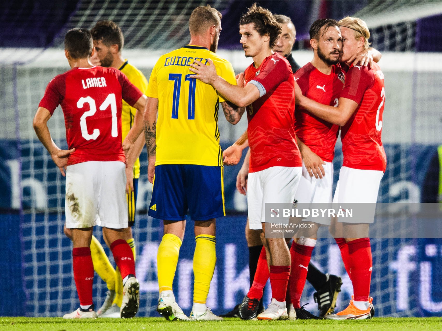 John Guidetti of Sweden among celebrating players of Austria