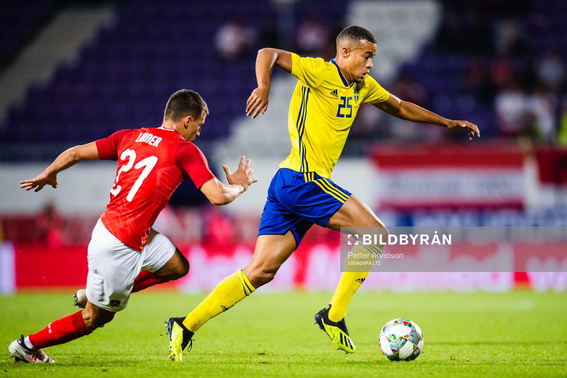 Stefan Lainer of Austria and Robin Quaison of Sweden