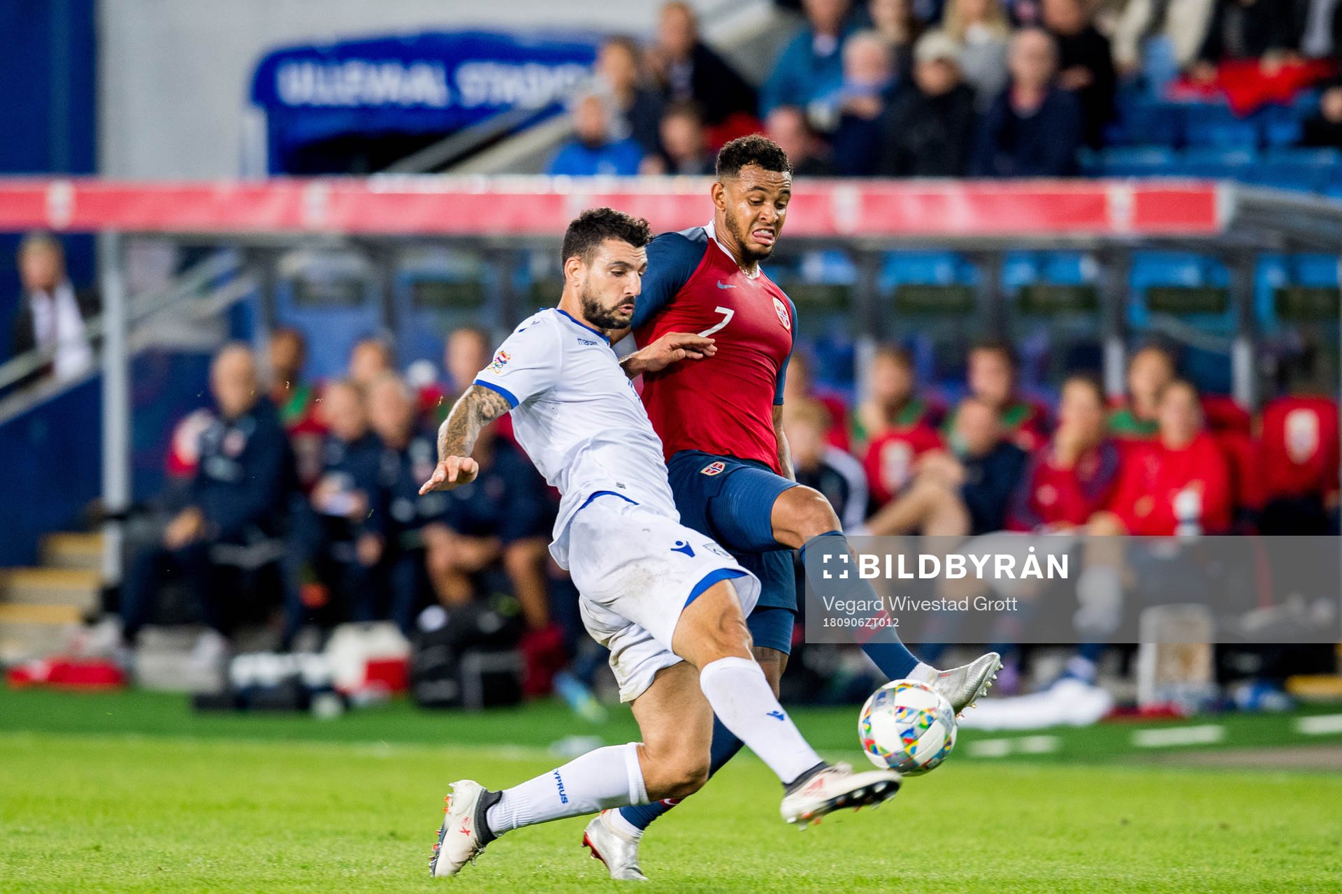 Giorgos Merkis of Cyprus and Joshua King of Norway