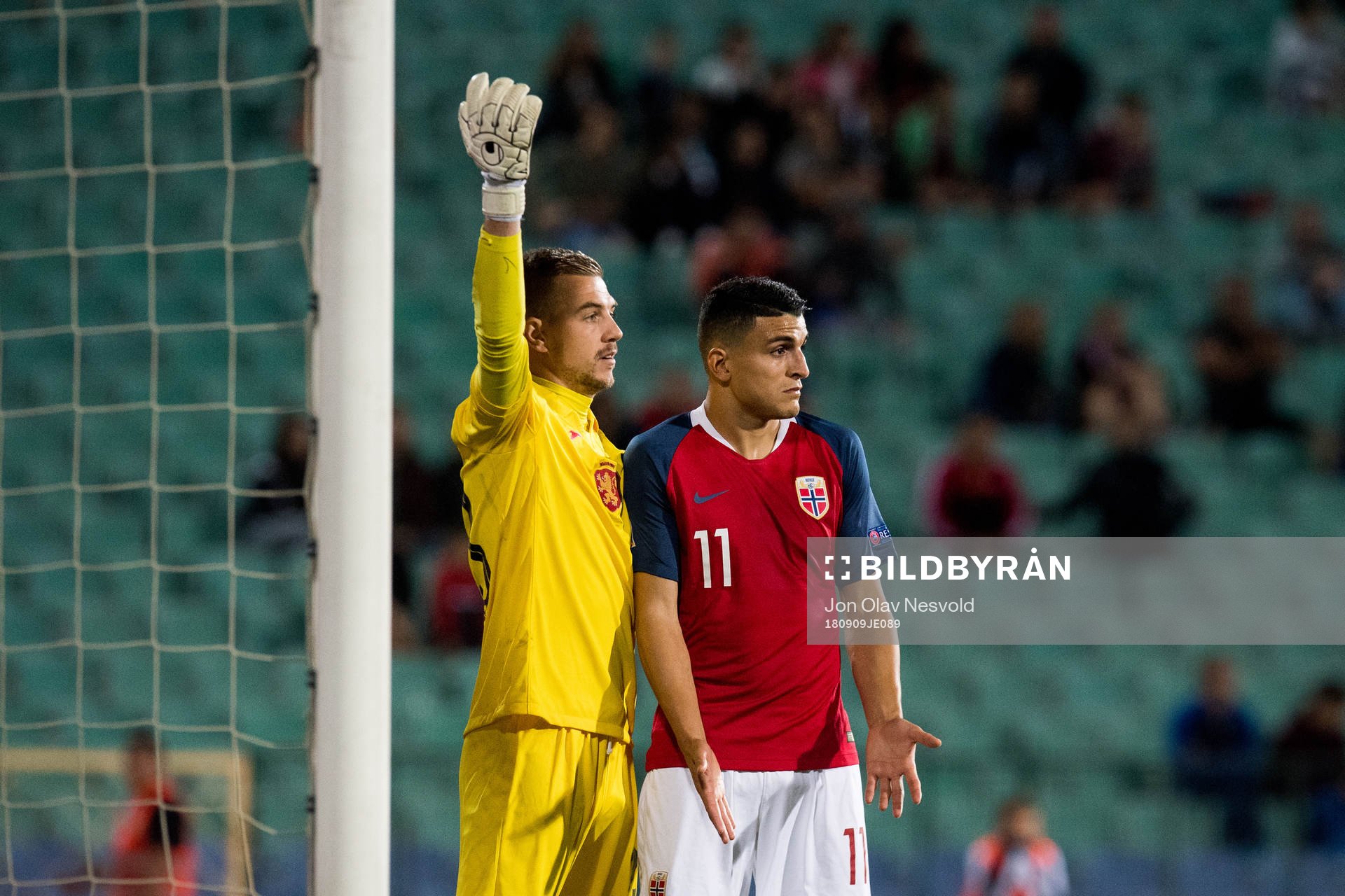 Goalkeeper Plamen Iliev of Bulgaria and Mohamed Elyounoussi