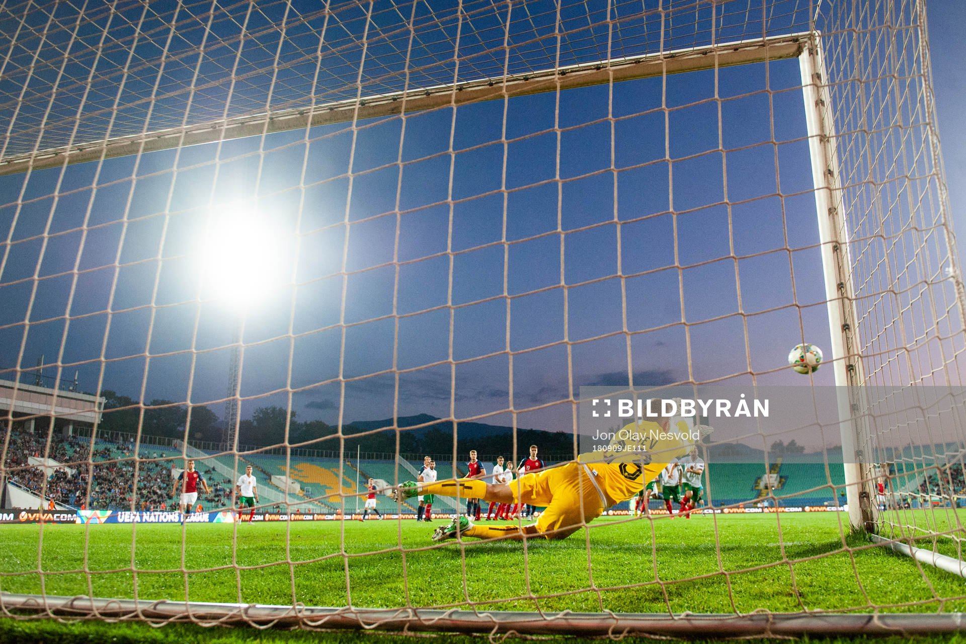 Goalkeeper Plamen Iliev of Bulgaria saves a free kick