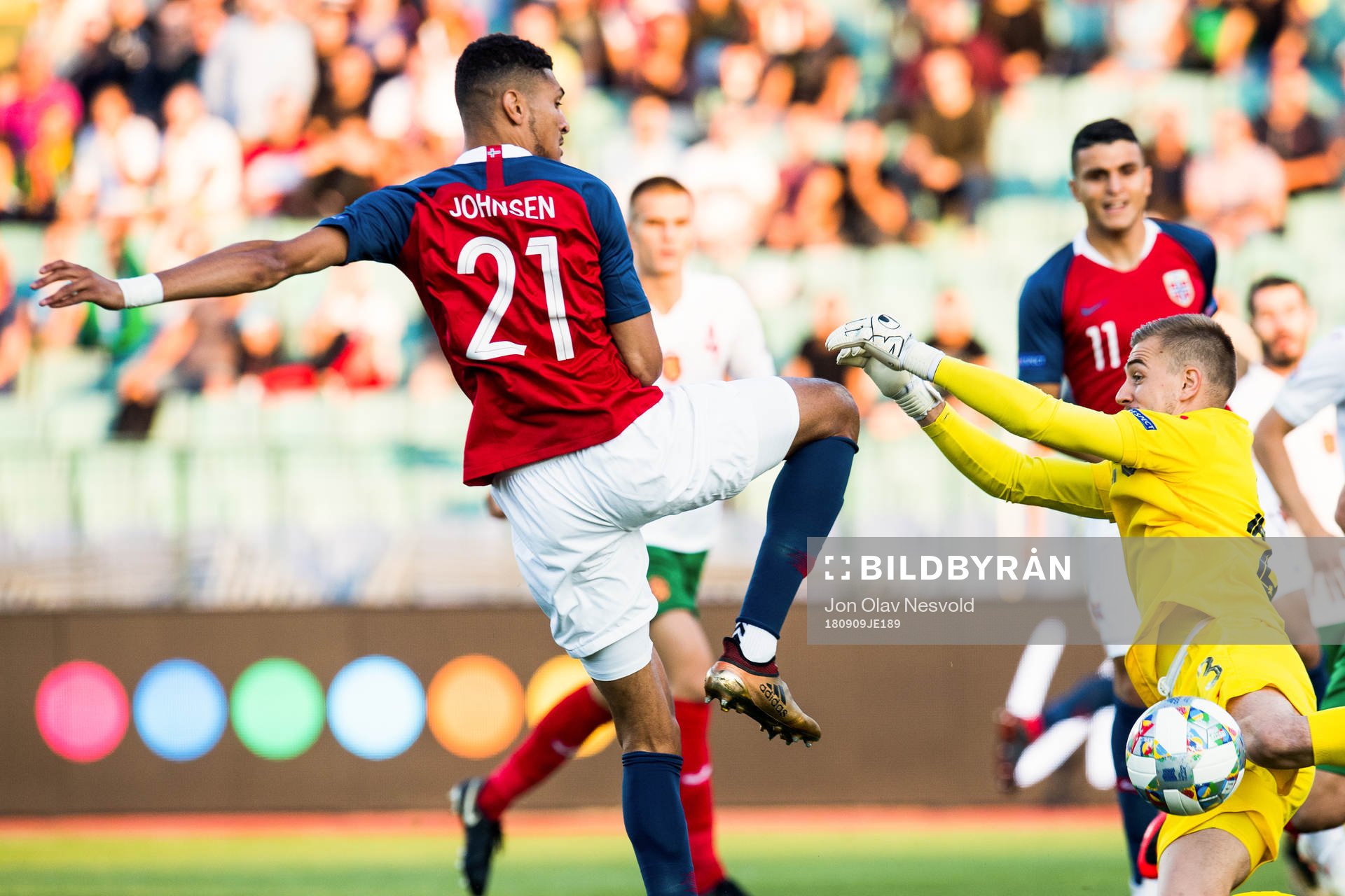 Bjørn Maars Johnsen of Norway and goalkeeper Plamen Iliev