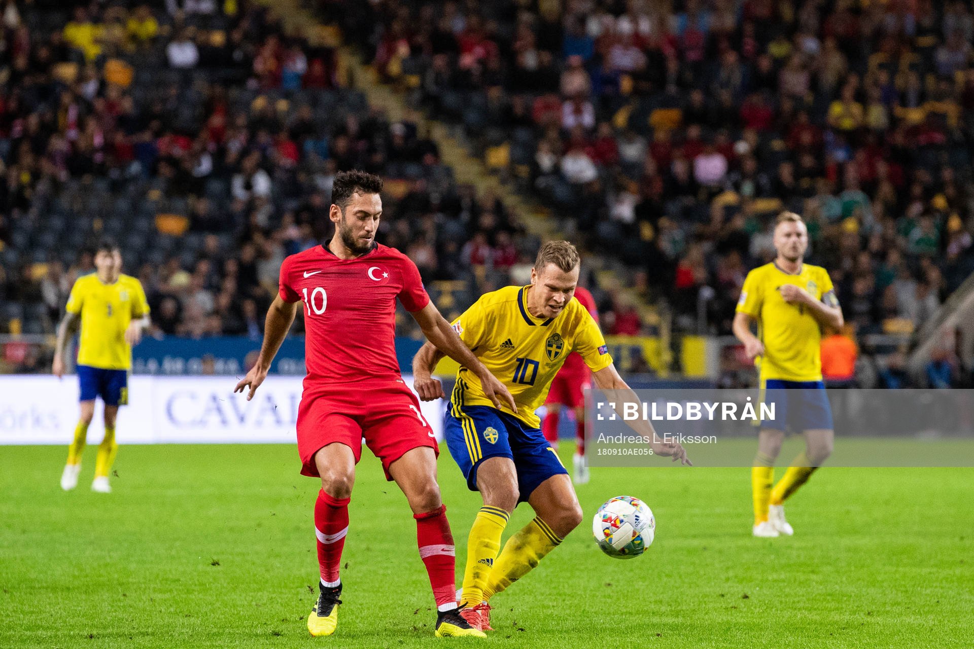 Hakan Calhanoglu of Turkey and Viktor Claesson of Sweden