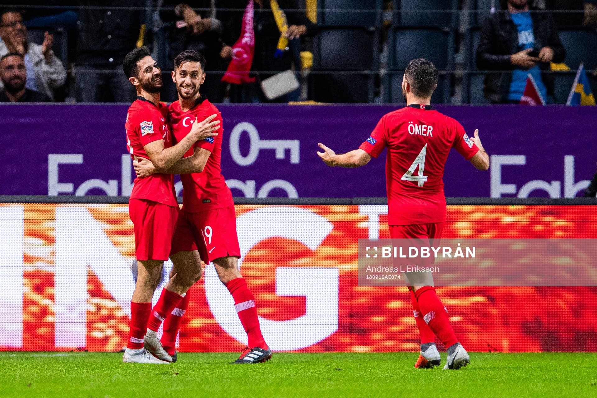 Emre Akbaba of Turkey celebrates with team mates after 2-2 during the Nations League match between Sweden and Turkey on september 10, 2018 in Stockholm.