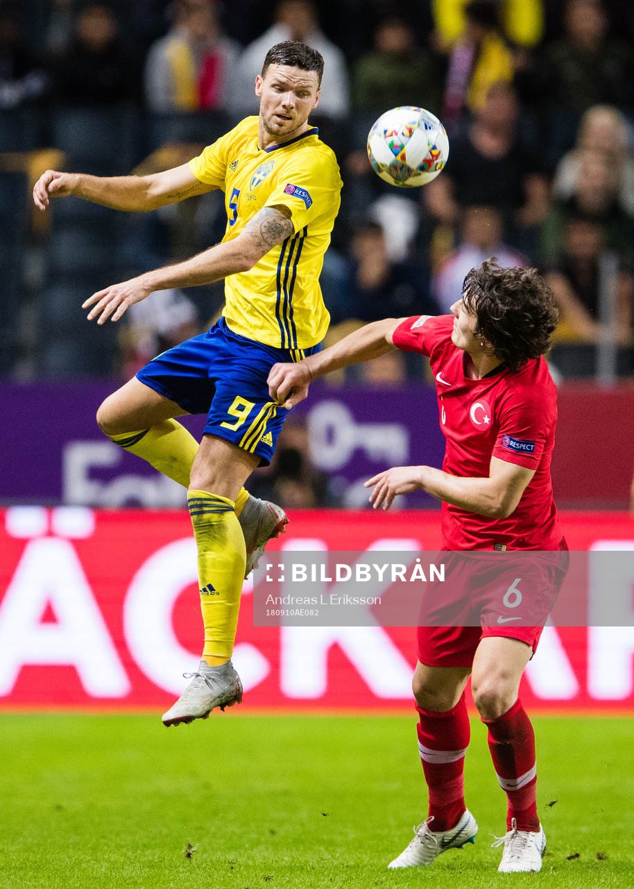 Marcus Berg of Sweden and Caglar Söyuncu of Turkey