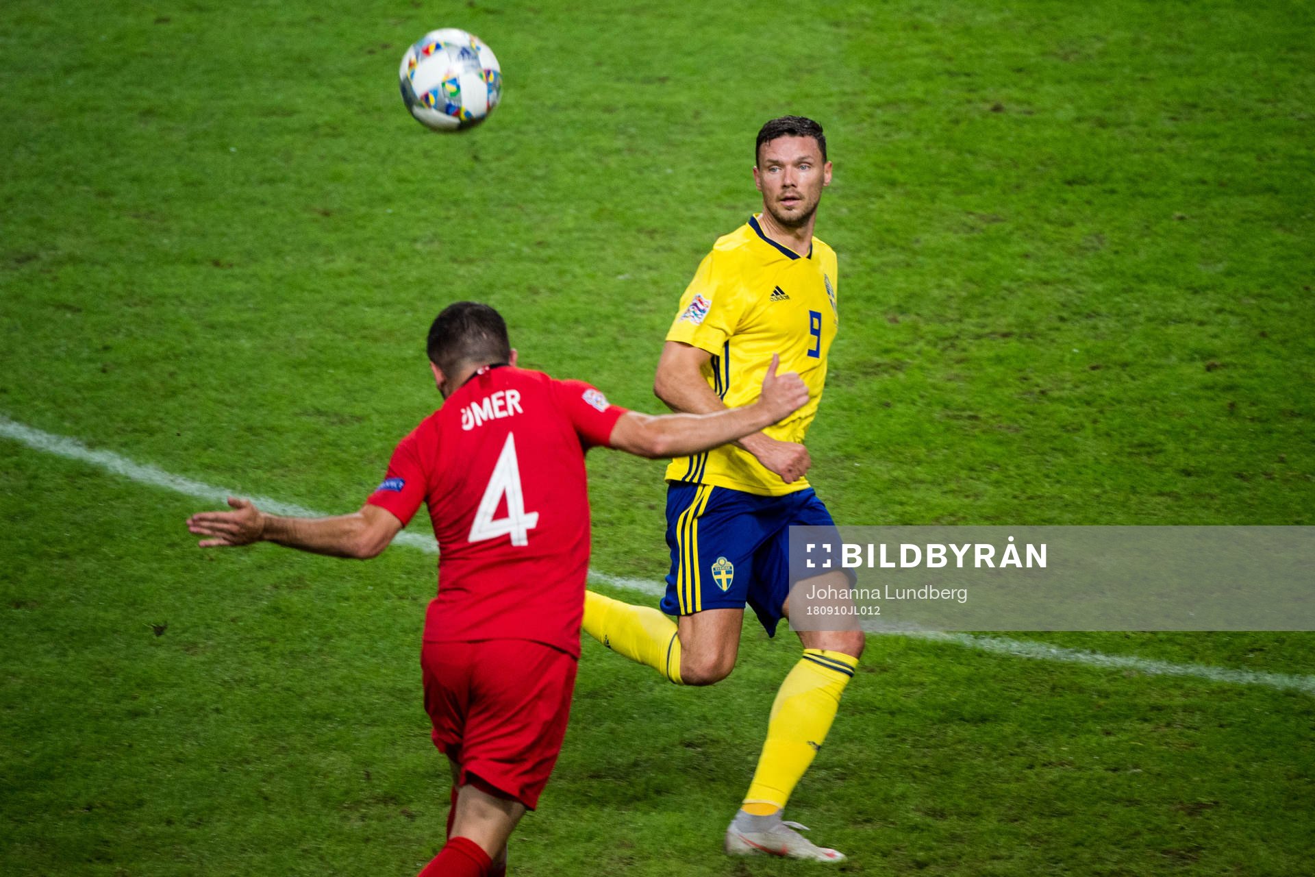 Marcus Berg of Sweden and Ömer Bayram of Turkey