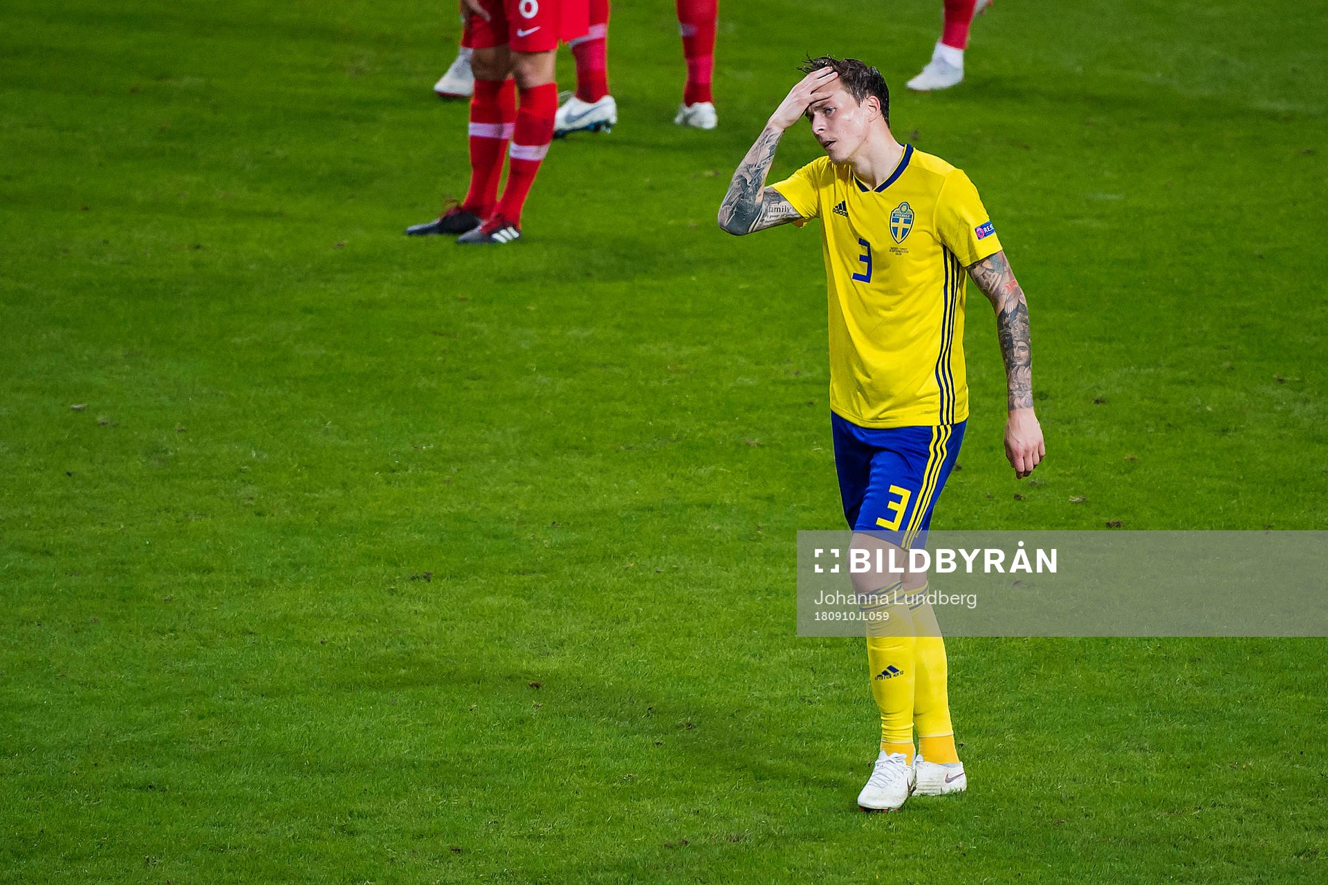 Victor Nilsson Lindelöf of Sweden looks dejected