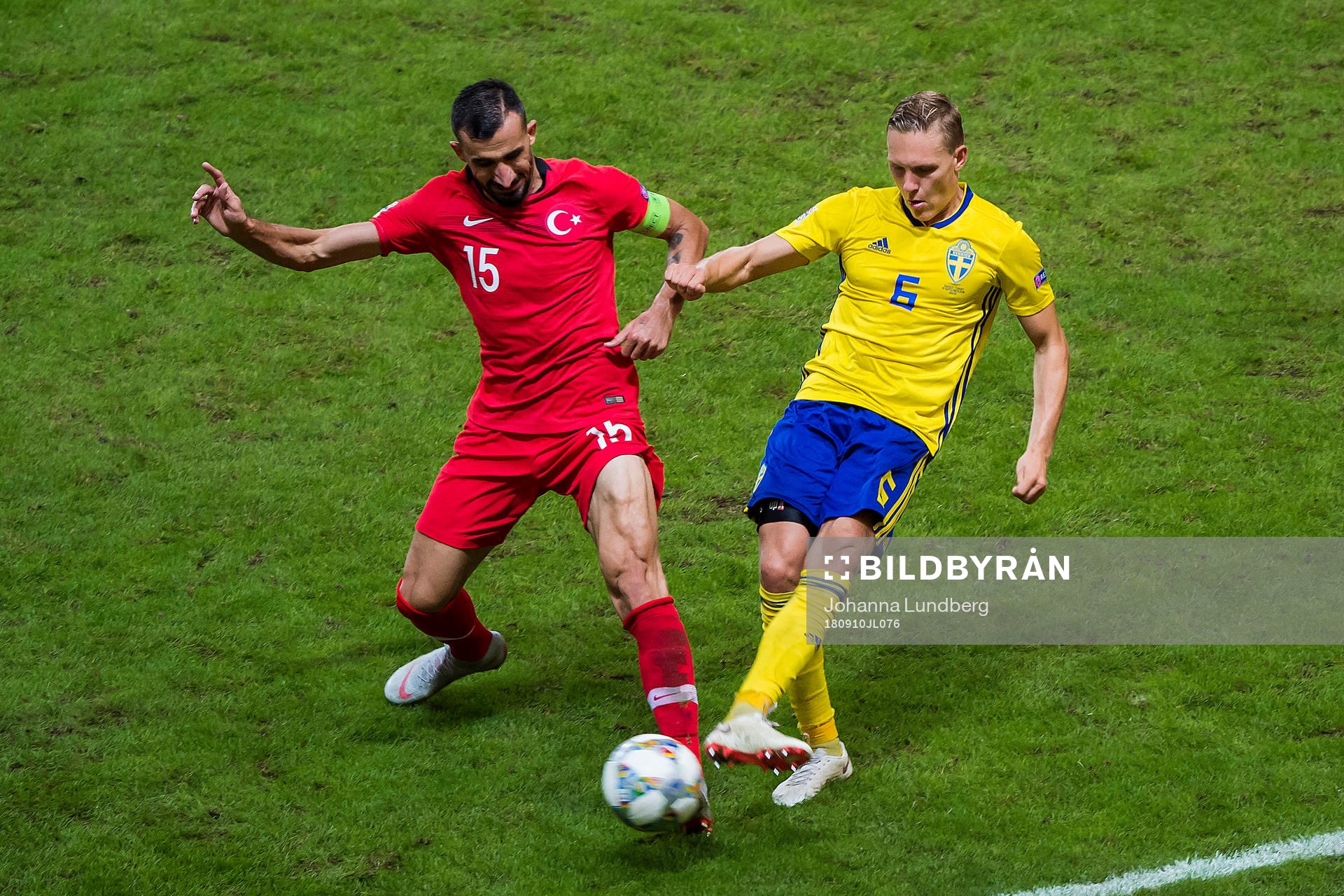 Mehmet Topal of Turkey och Ludwig Augustinsson of Sweden during the Nations League match between Sweden and Turkey on september 10, 2018 in Stockholm.