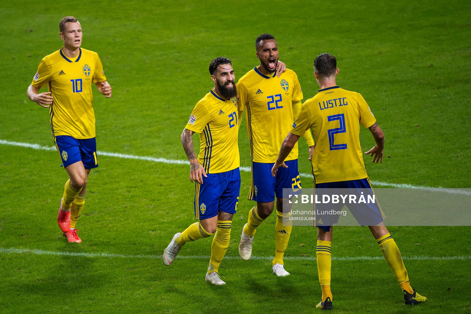 Isaac Kiese Thelin of Sweden celebrates with Jimmy Durmaz,