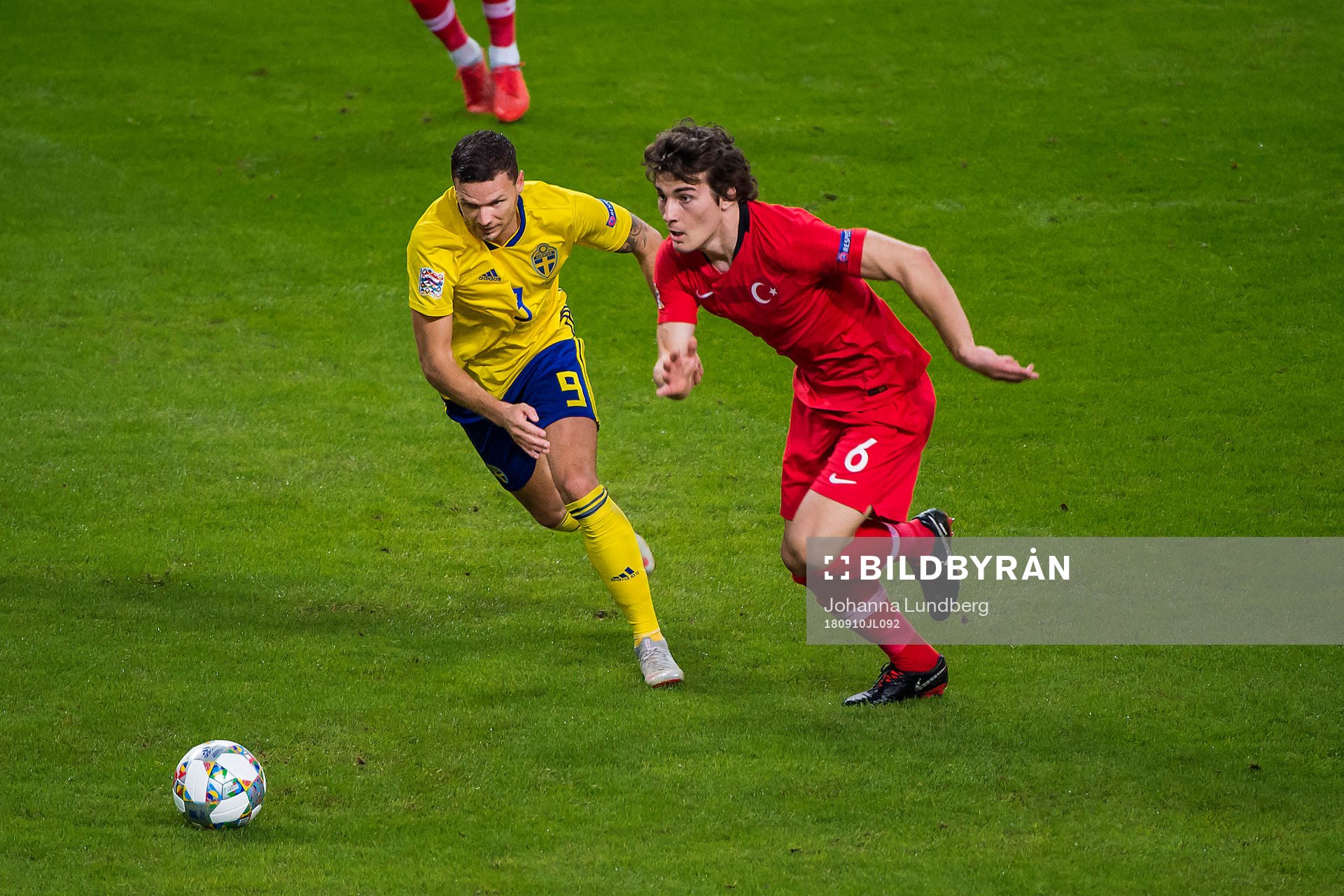 Marcus Berg of Sweden and Caglar Söyuncu of Turkey