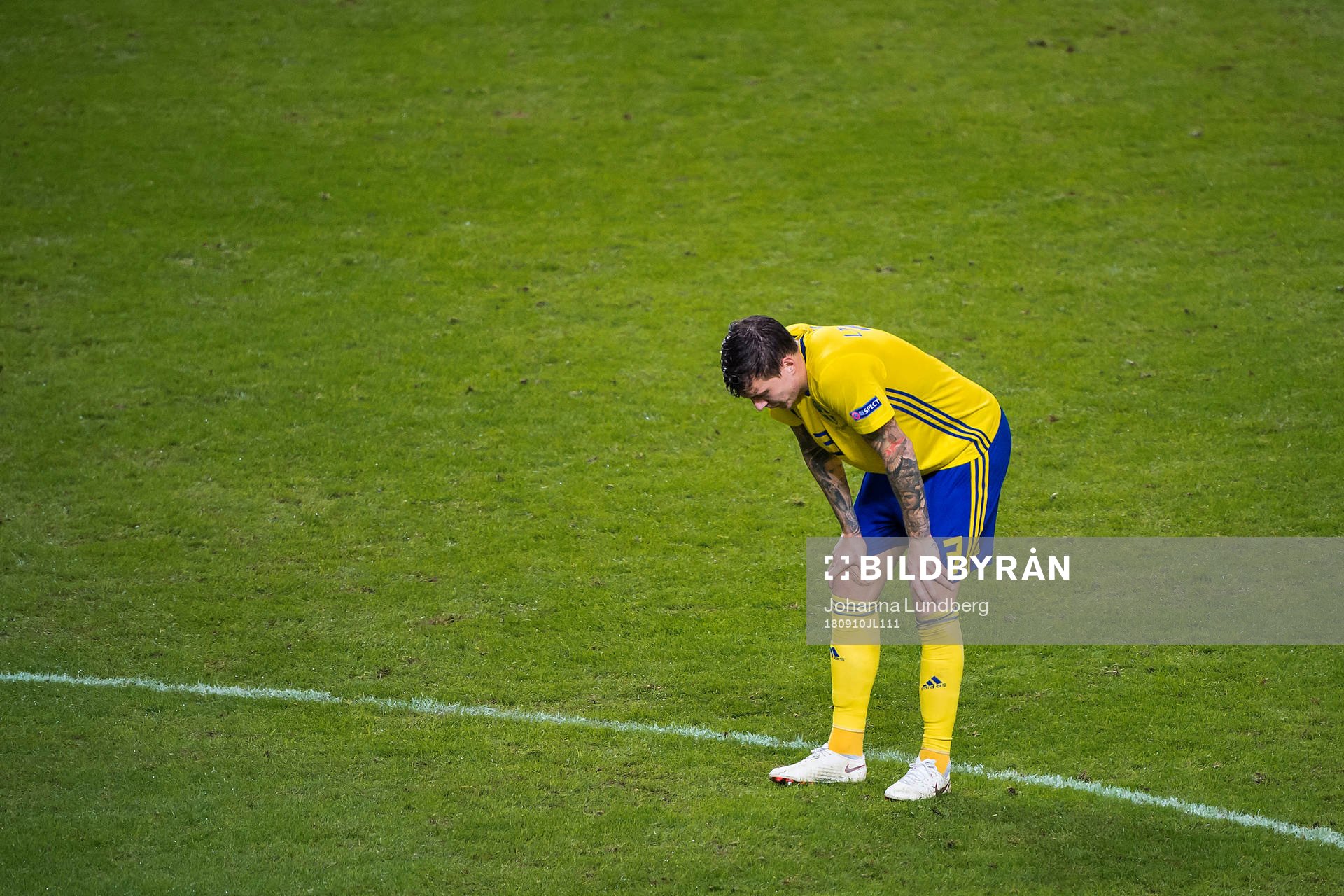 Victor Nilsson Lindelöf of Sweden looks dejected