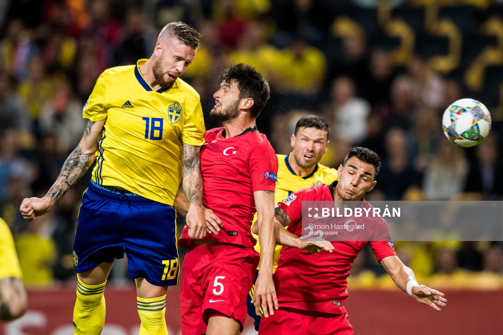 Pontus Jansson and Marcus Berg of Sweden in action with