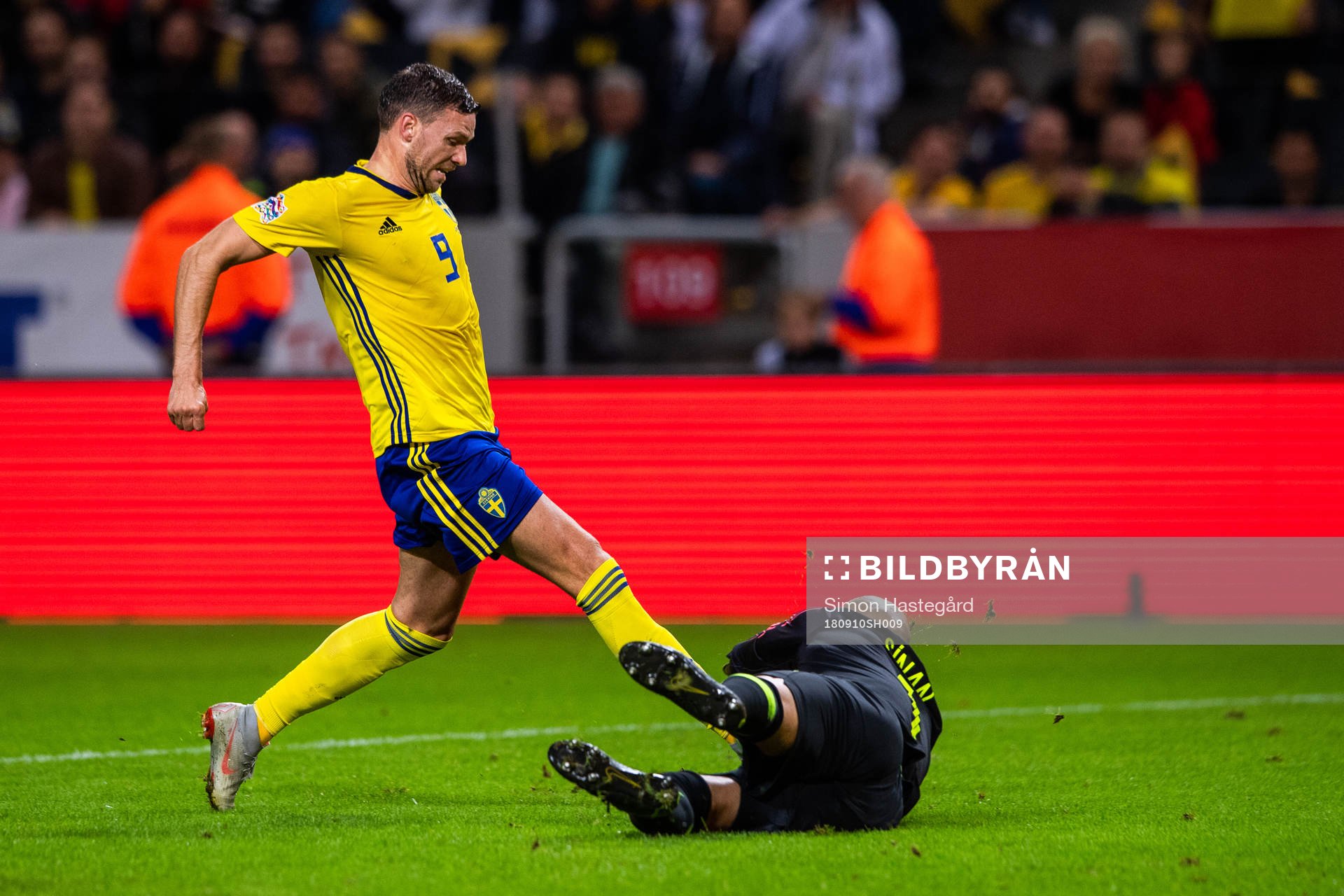 Marcus Berg of Sweden and goalkeeper Sinan Bolat of Turkey