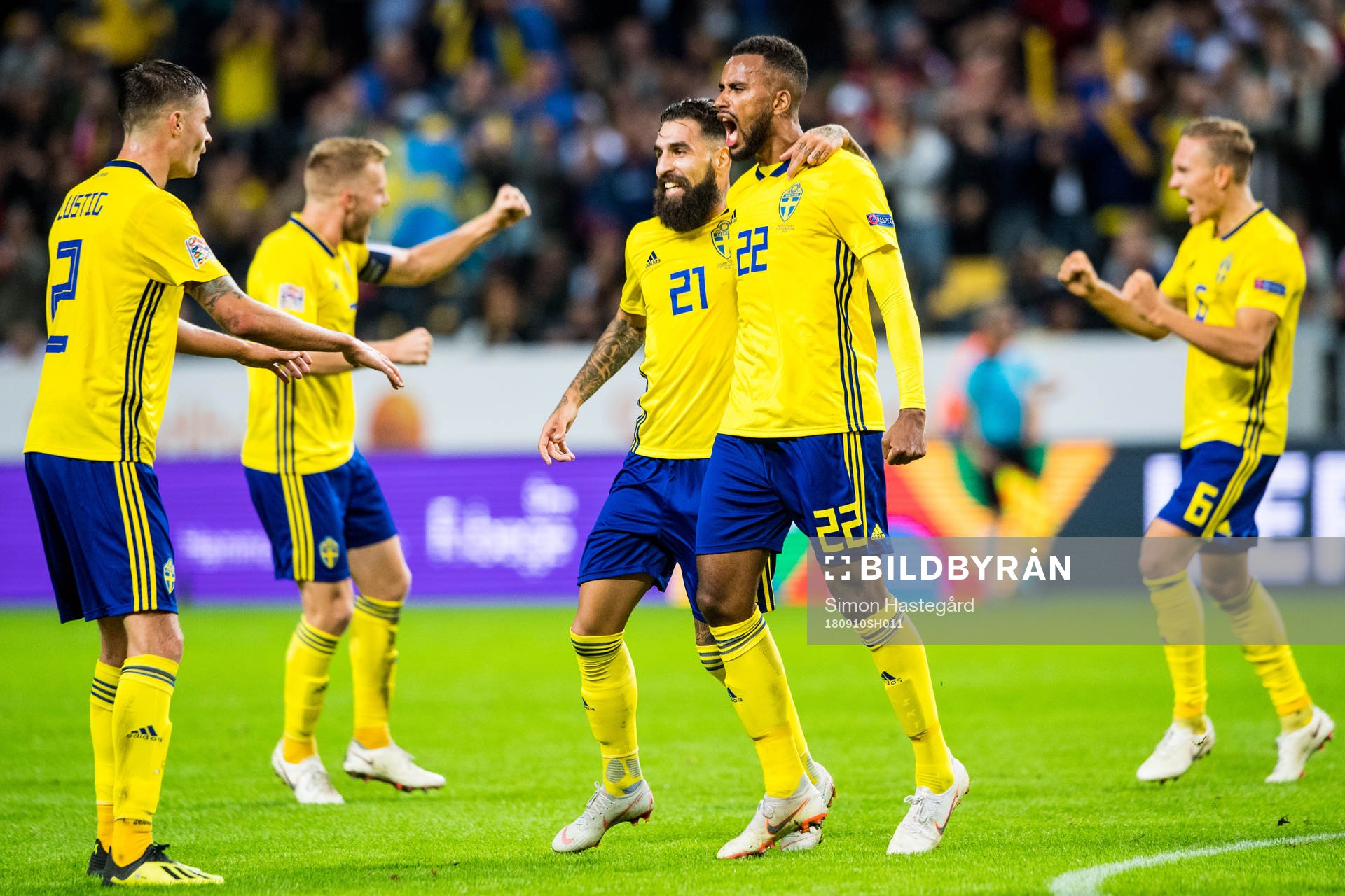Isaac Kiese Thelin of Sweden celebrates with Jimmy Durmaz