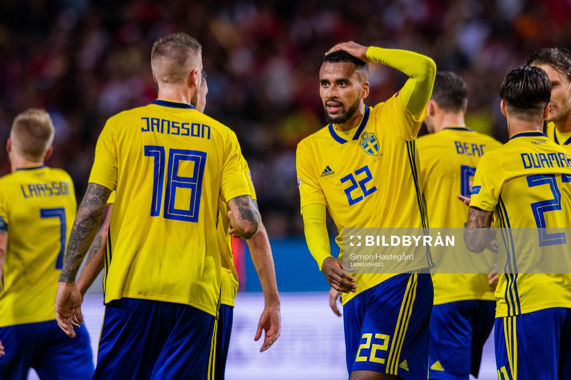 Pontus Jansson and Isaac Kiese Thelin of Sweden celebrates