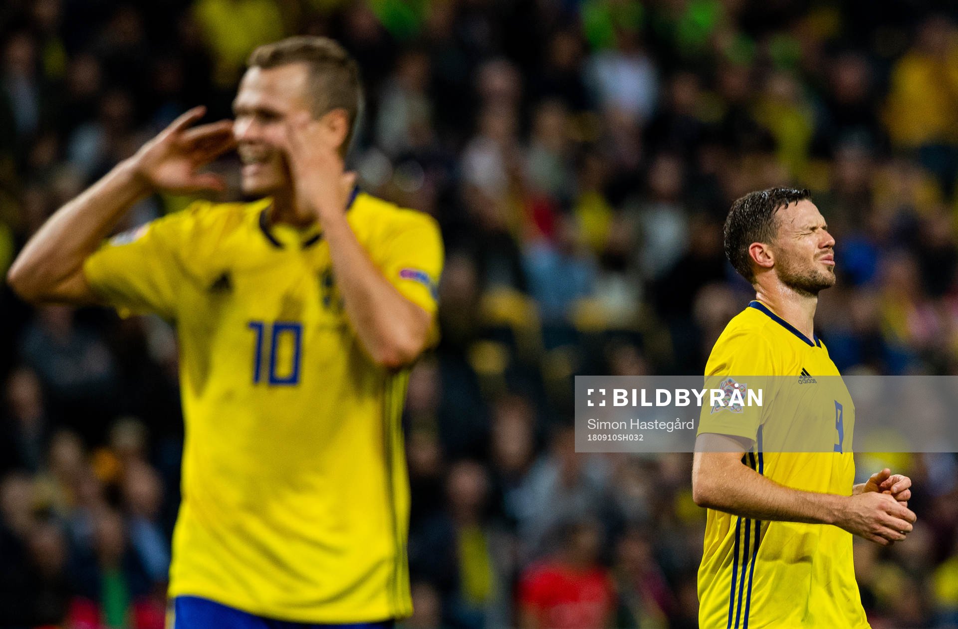 Viktor Claesson of Sweden and Marcus Berg of Sweden