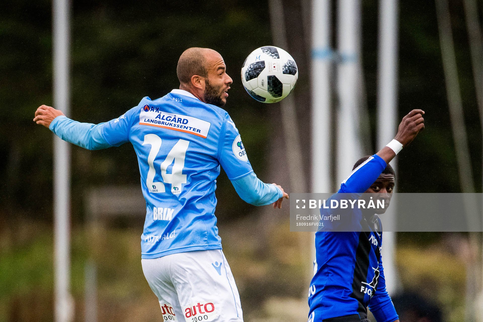 Kristian Brix of Sandnes Ulf and Alioune Ndour of Florø