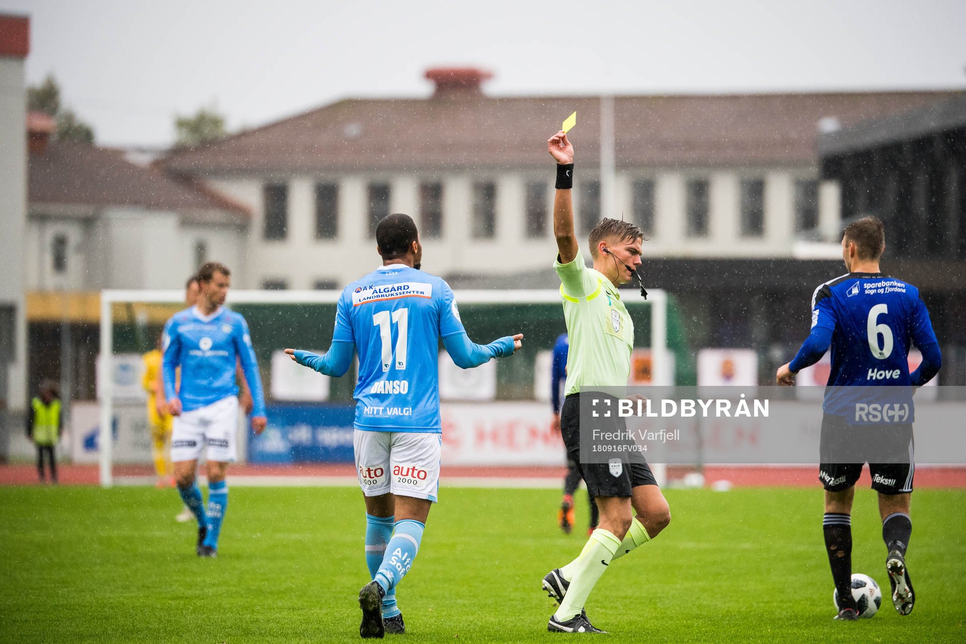Erixon Danso of Sandnes Ulf is shown a yellow card by