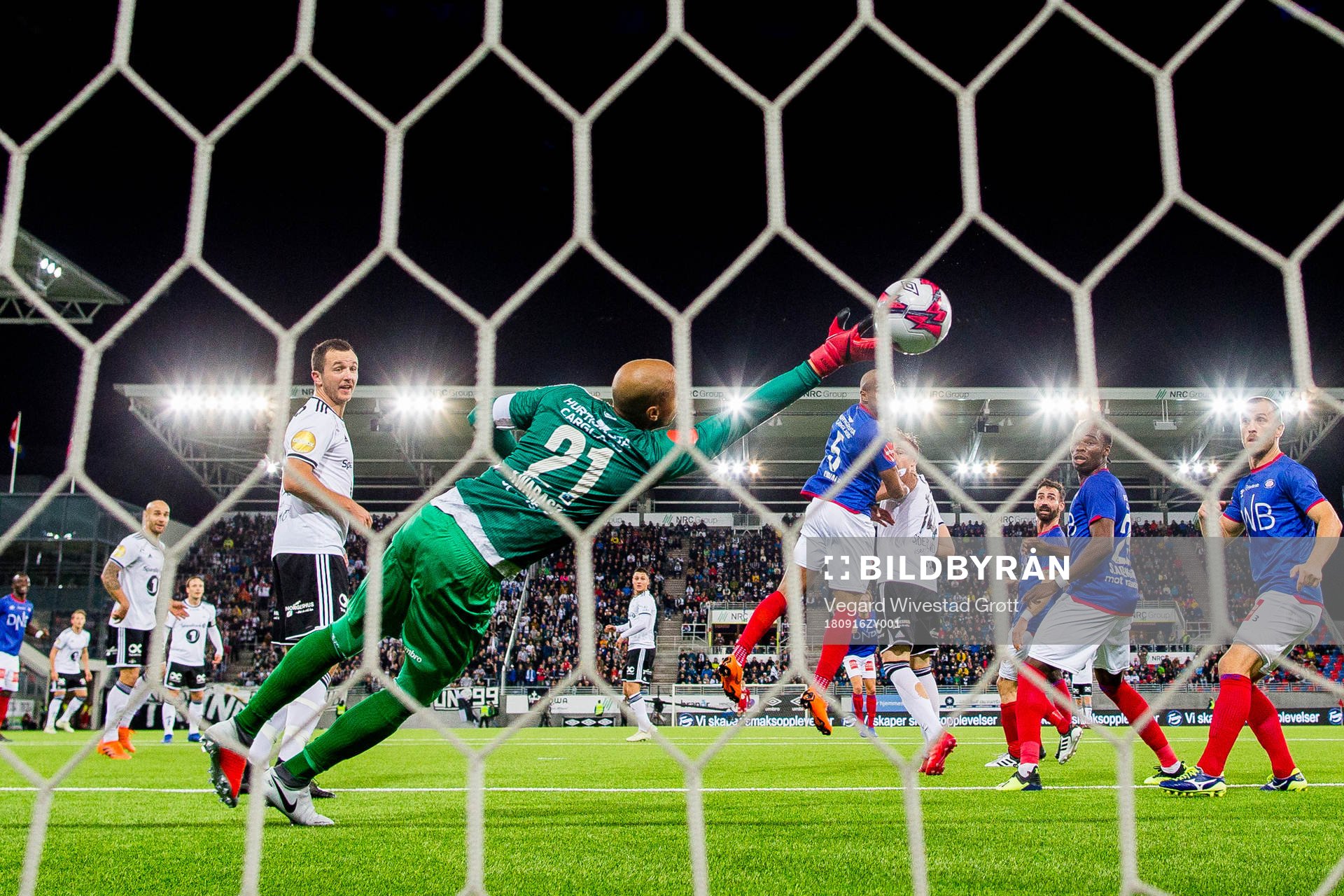 Jonathan Levi of Rosenborg scores 1-1 behind goalkeeper