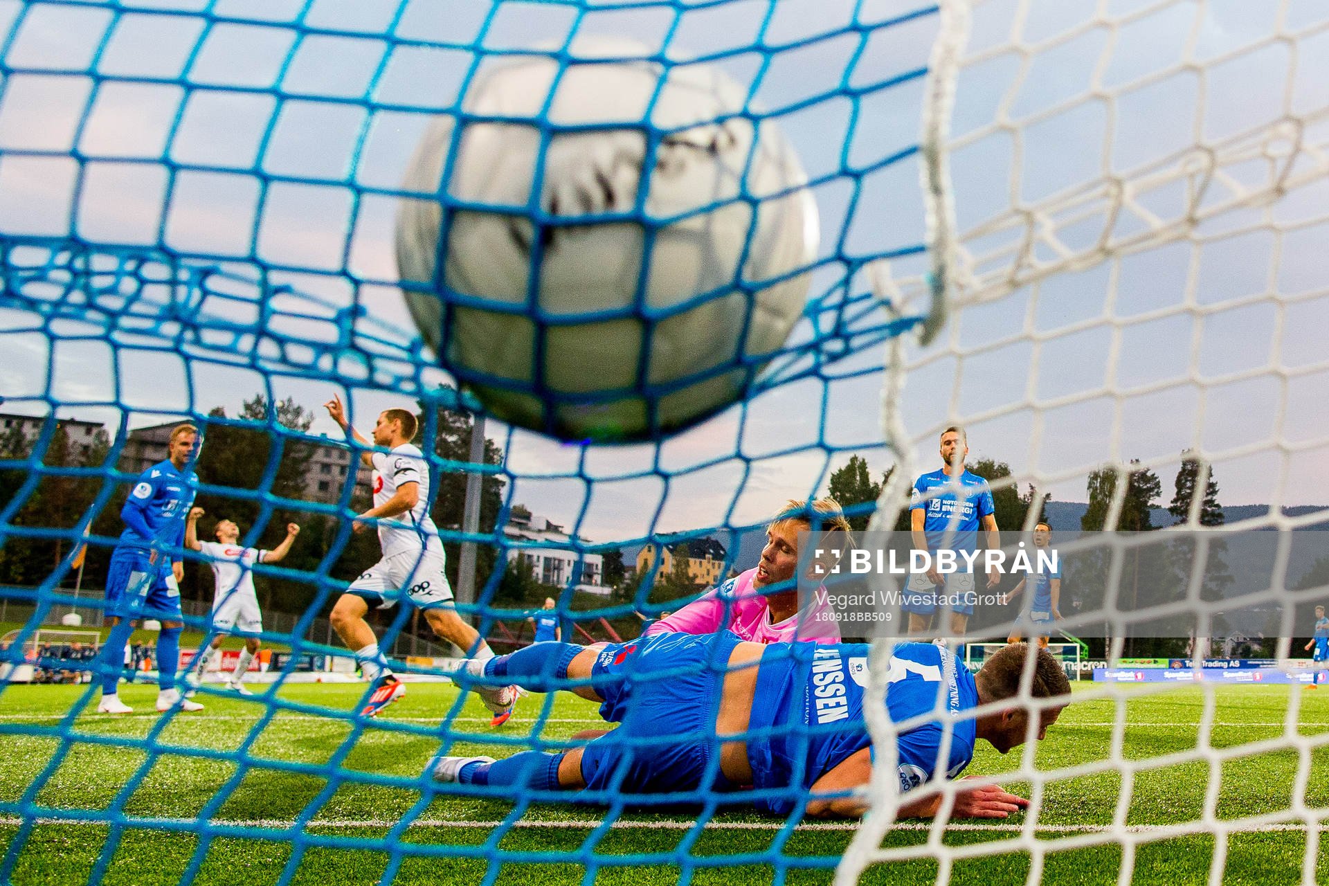 Tommy Høiland of Viking scores 0-1 past Steffen Jenssen and goalkeeper Nils Jonathan Johansson of Notodden during the OBOS-ligaen match between Notodden and Viking on September 18, 2018 in Notodden.