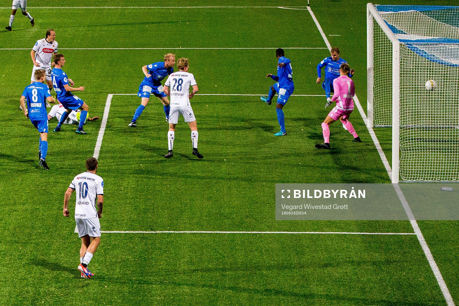 Axel Andresson of Viking (partly hidden) scores 1-2 behind goalkeeper Nils Jonathan Johansson of Notodden during the OBOS-ligaen match between Notodden and Viking on September 18, 2018 in Notodden.