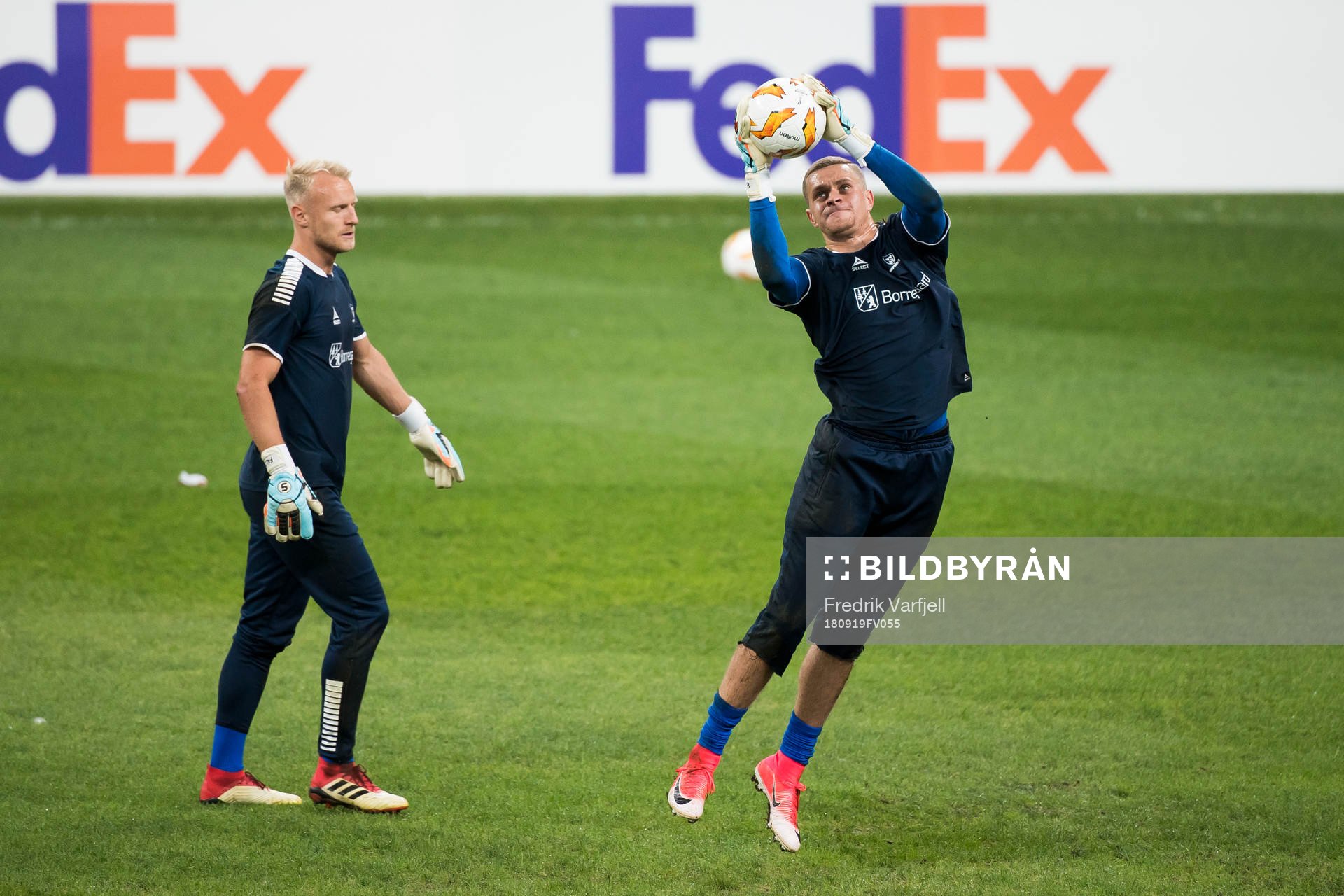 Goalkeeper Aslak Falch and goalkeeper Aleksandr Vasyutin of