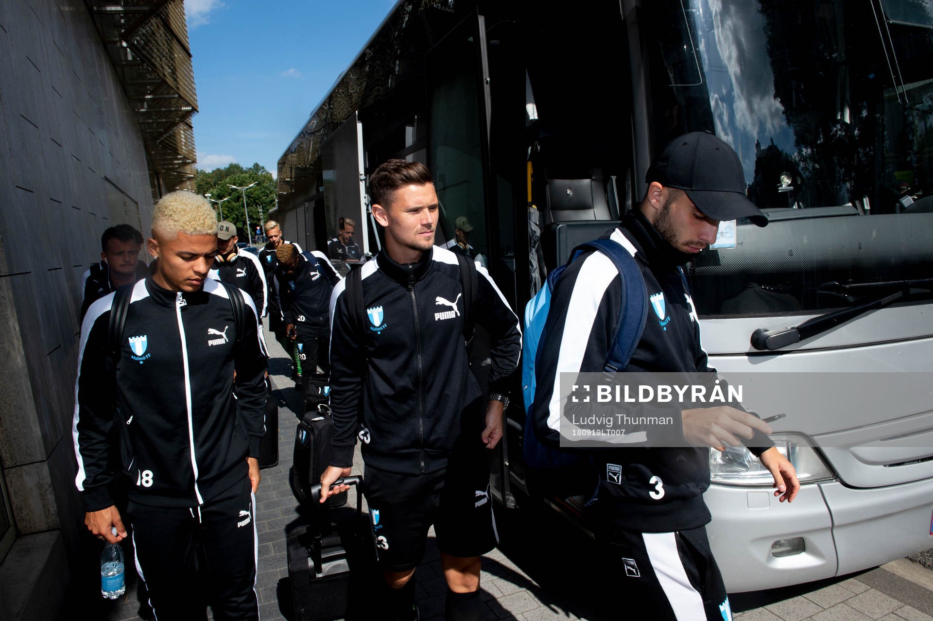 Romain Gall, Marcus Antonsson and Egzon Binaku of Malmö FF arrives at the hotel ahead of the Europa League match against Genk on September 19, 2018 in Genk.